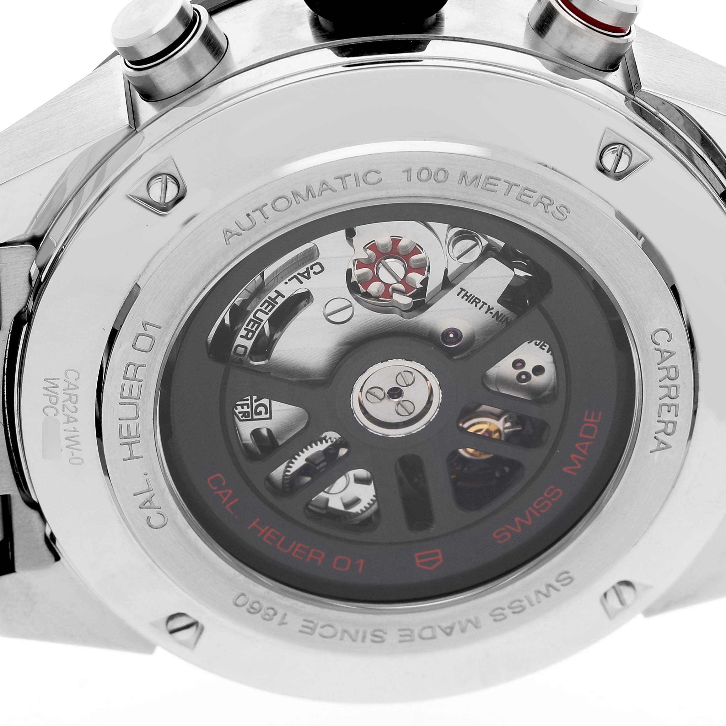 The Tag Heuer Carrera CAR2A1W.BA0703 Men's Stainless Steel Transparent Dial watch is shown from the back, revealing its automatic movement and rotor details.