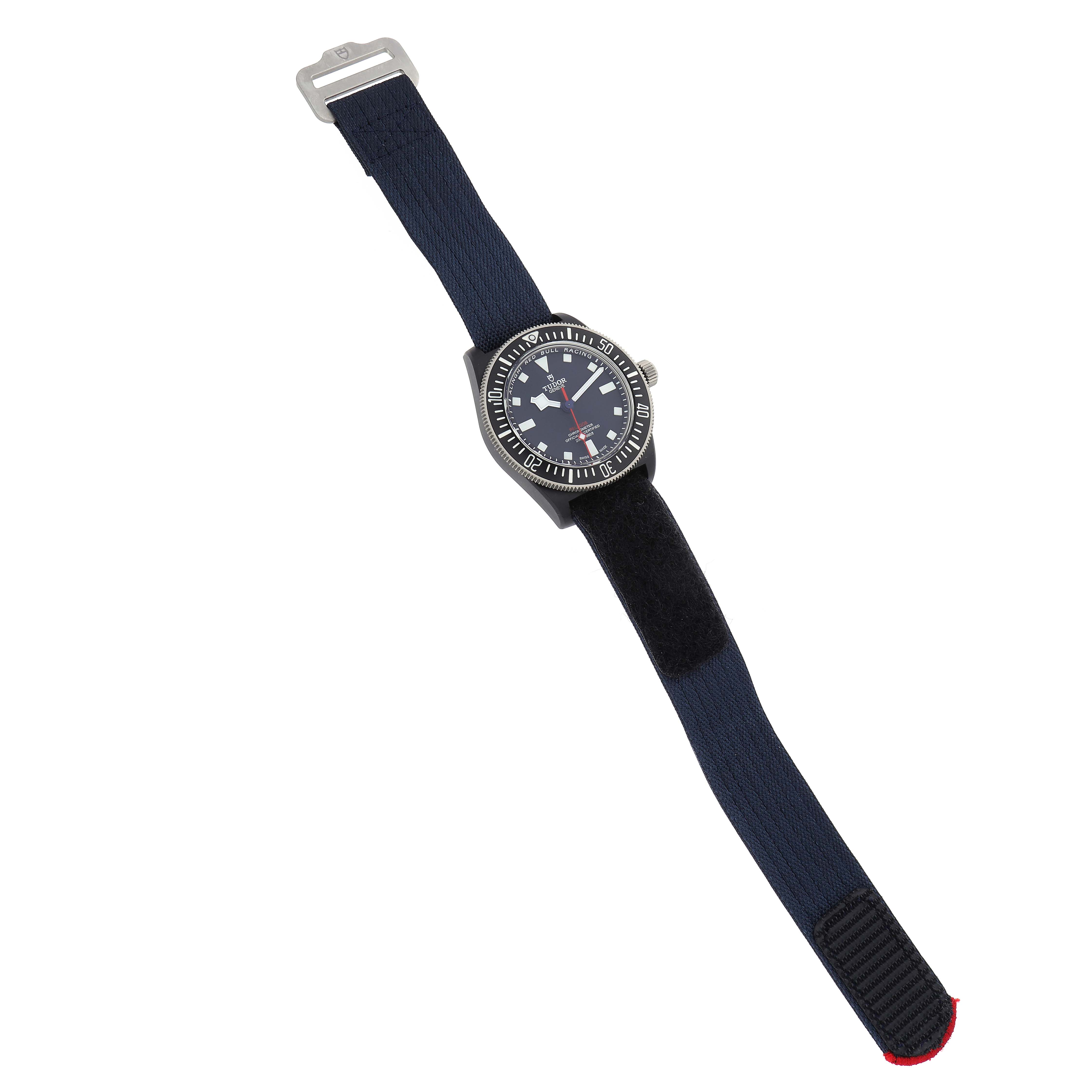 The Tudor Pelagos M25707KN-0001 Men
s Stainless Steel Blue Dial M25707KN-0001 Men
s Stainless Steel Blue Dial watch is shown at an angled top view, highlighting its face and extended strap.