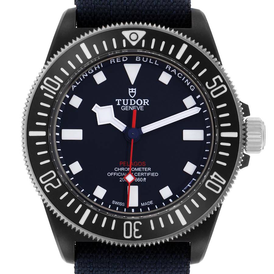 The Tudor Pelagos watch is shown from a front angle, highlighting the dial, bezel, and crown.