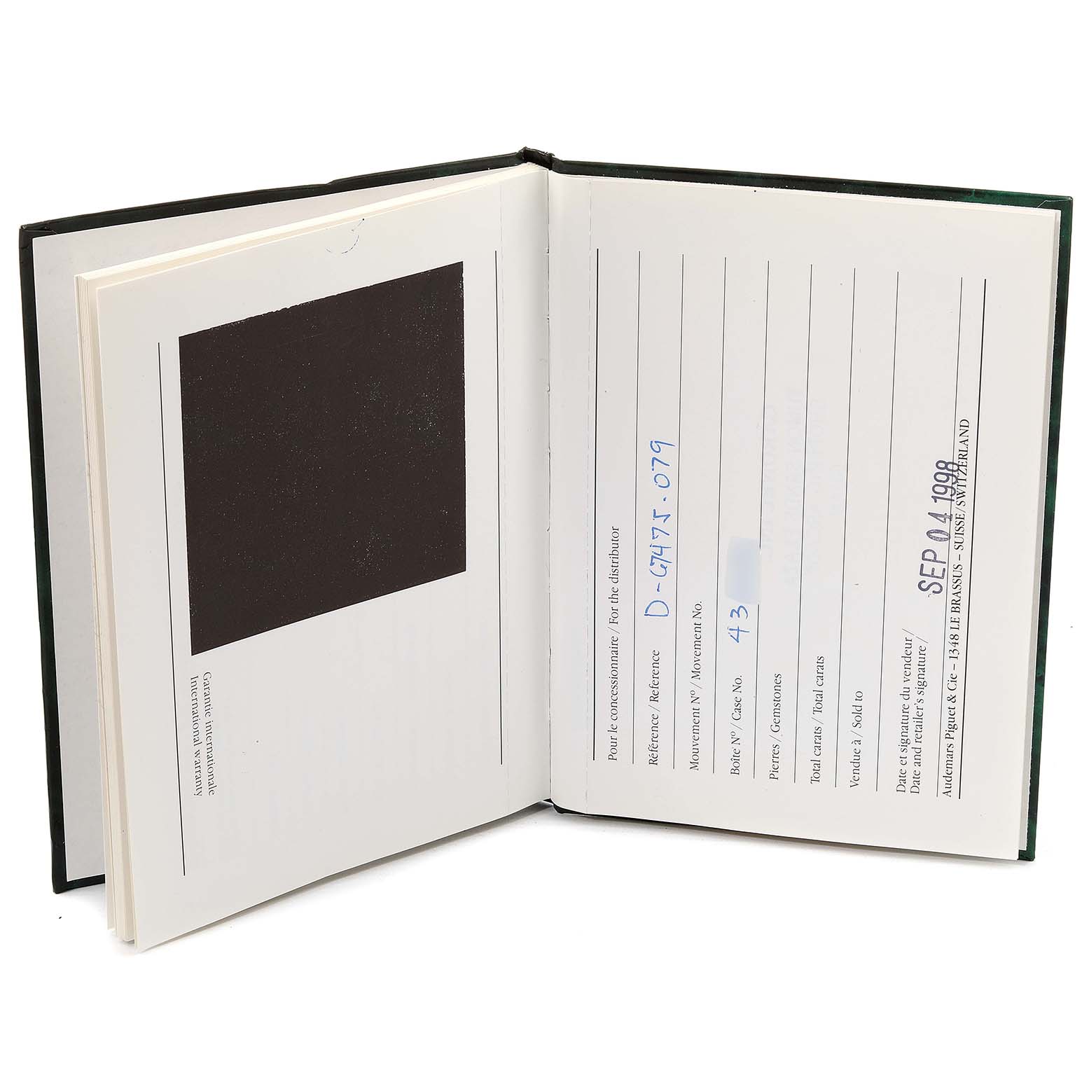 This image shows the opened warranty and service book for the Audemars Piguet Royal Oak 15000ST.OO.0789ST.05 Men
s Stainless Steel Grey Dial 15000ST.OO.0789ST.05 Men
s Stainless Steel Grey Dial model.