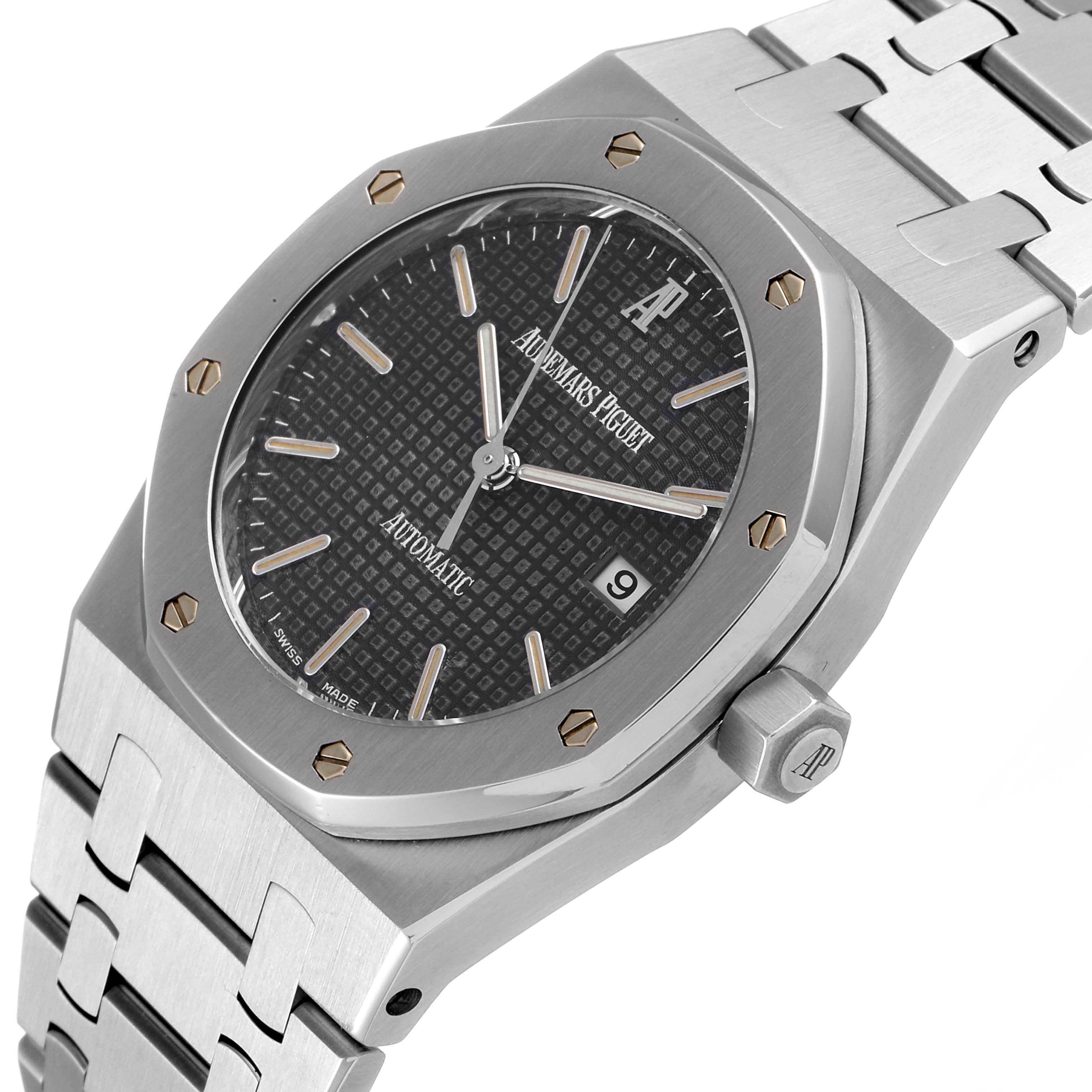 This image shows a close-up, angled view of the Audemars Piguet Royal Oak 15000ST.OO.0789ST.05 Men
s Stainless Steel Grey Dial 15000ST.OO.0789ST.05 Men
s Stainless Steel Grey Dial watch face, bezel, and part of the bracelet.