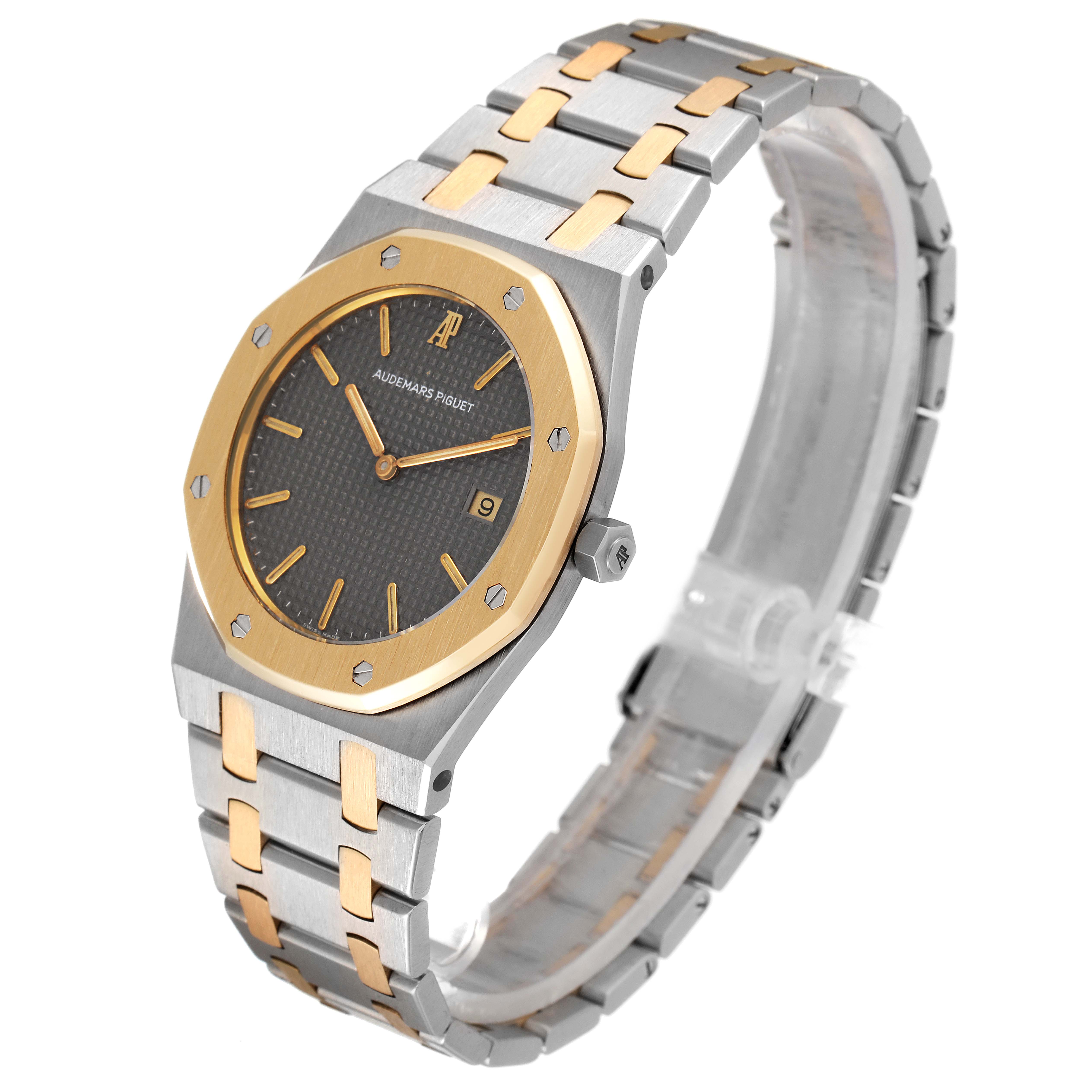 The Audemars Piguet Royal Oak 56175SA.OO.0789SA.01 Men's Steel and Gold (two tone) Grey Dial 56175SA.OO.0789SA.01 Men's Steel and Gold (two tone) Grey Dial watch is shown at a three-quarter angle displaying its face, bezel, and bracelet with bicolor design.