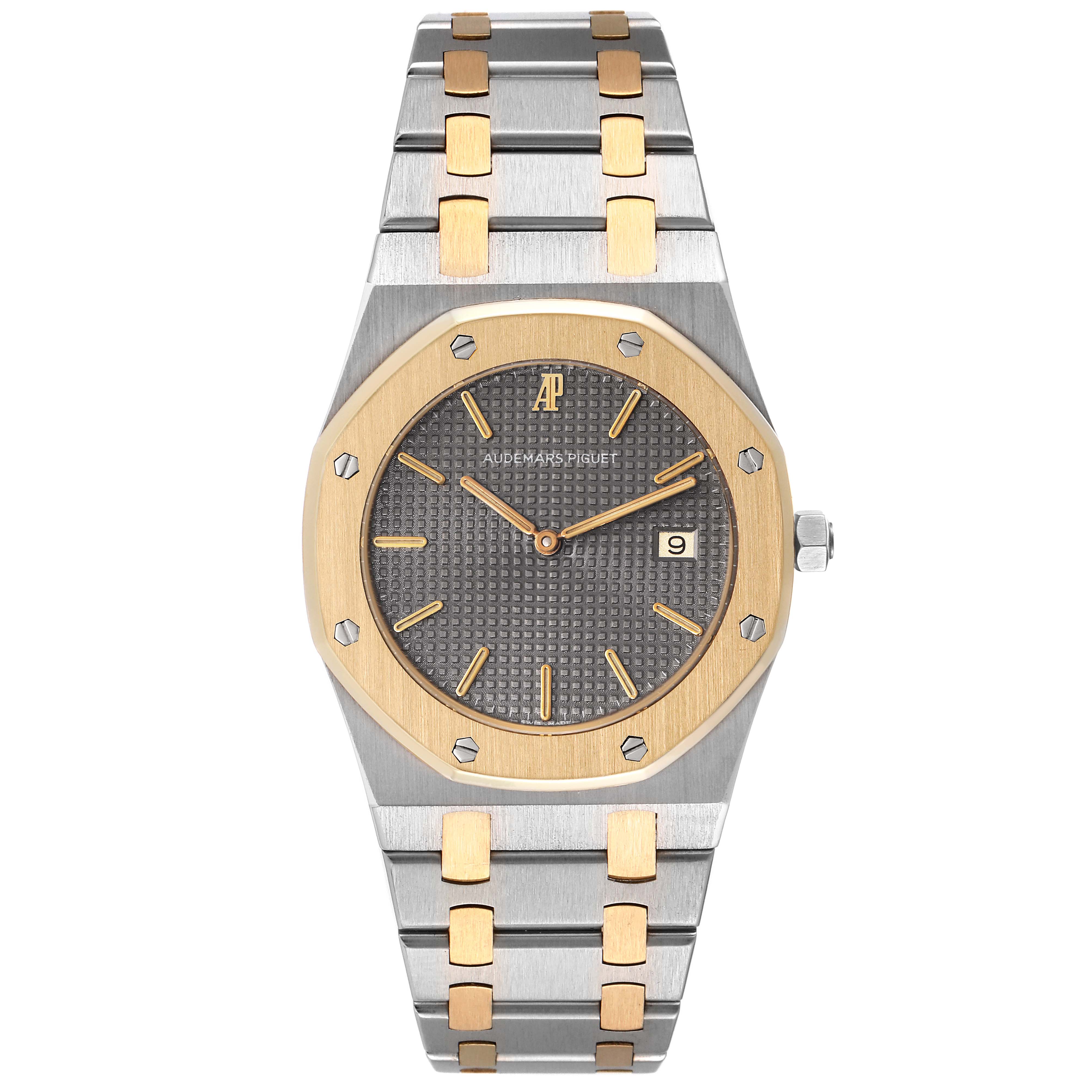 The image shows a front view of the Audemars Piguet Royal Oak 56175SA.OO.0789SA.01 Men's Steel and Gold (two tone) Grey Dial 56175SA.OO.0789SA.01 Men's Steel and Gold (two tone) Grey Dial watch, highlighting its dial, bezel, and bracelet.