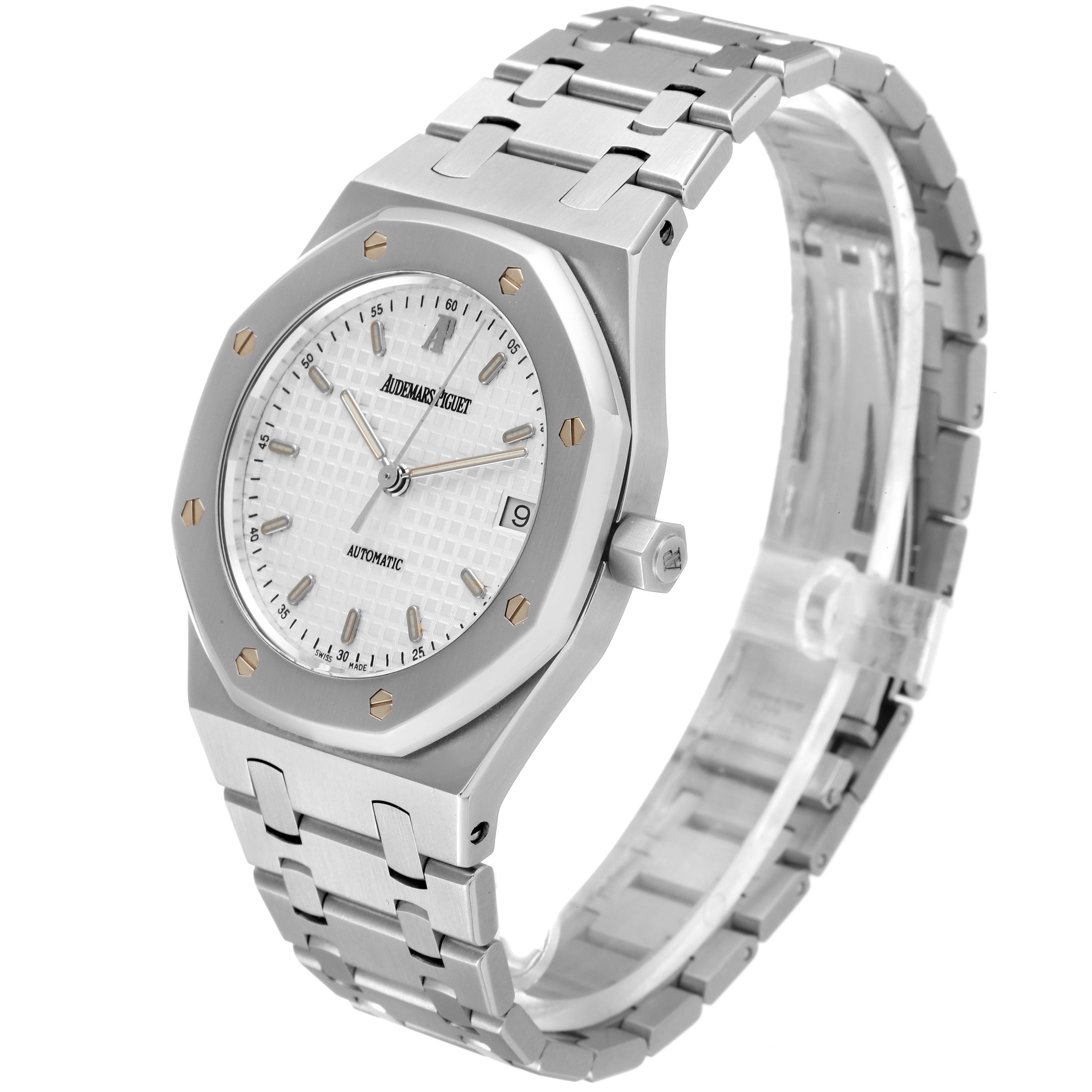 The image shows a side view of an Audemars Piguet Royal Oak 14790ST Men's Stainless Steel White Dial 14790ST Men's Stainless Steel White Dial watch, highlighting its face, crown, and stainless steel bracelet.