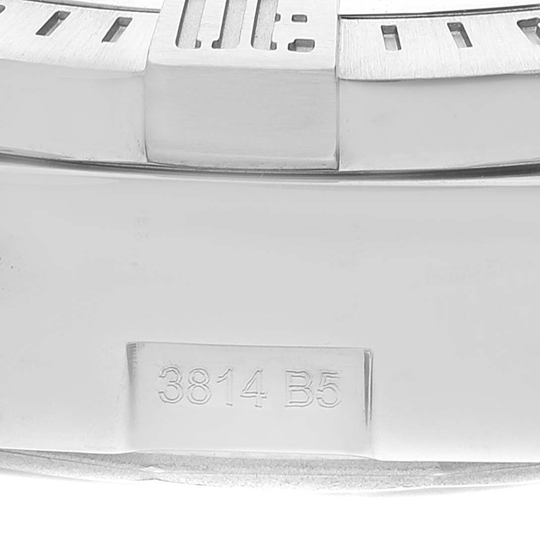 The image shows a close-up of a portion of the bezel and case with engraved numbers of a Breitling Avenger A13381 Men's Stainless Steel Black Dial A13381 Men's Stainless Steel Black Dial watch.