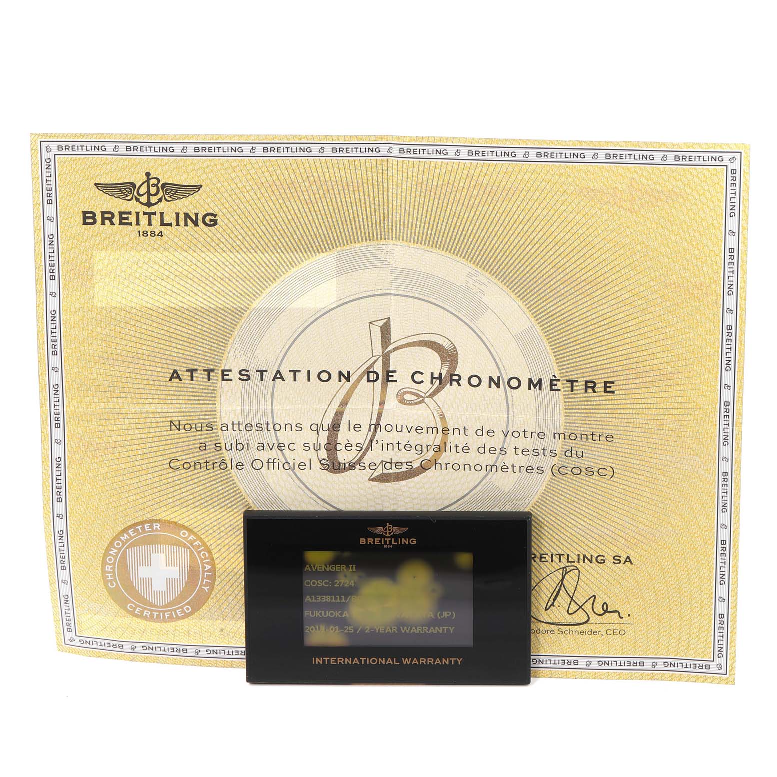 The image shows an official Breitling certificate and an international warranty card for the Avenger II model.