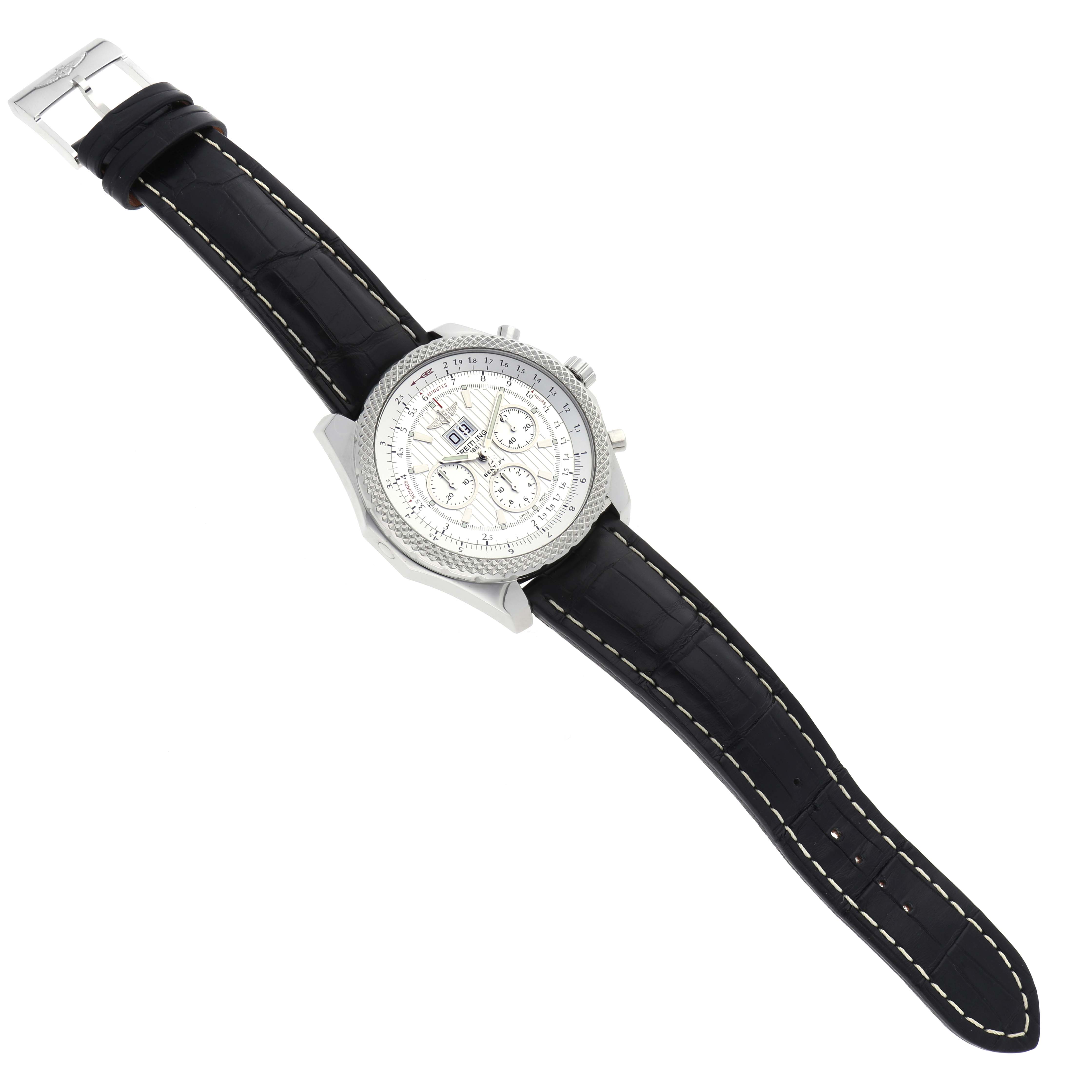 The Breitling Bentley A44364 Men
s Stainless Steel Silver Dial A44364 Men
s Stainless Steel Silver Dial watch is shown at an angle displaying the dial, case, leather strap, and buckle.