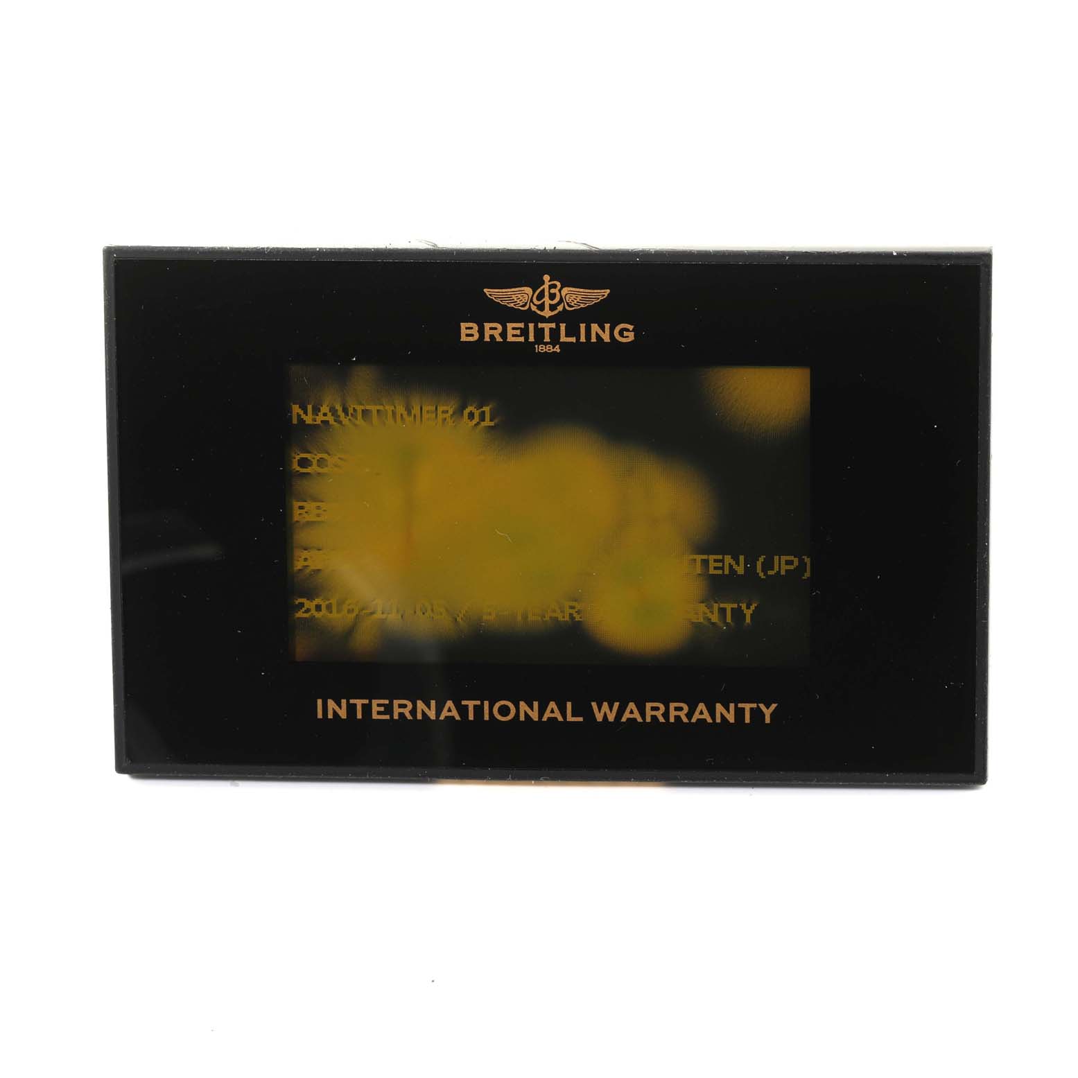 The image shows an international warranty card for the Breitling Navitimer RB0120 Men
s Rose Gold Black Dial RB0120 Men
s Rose Gold Black Dial model.