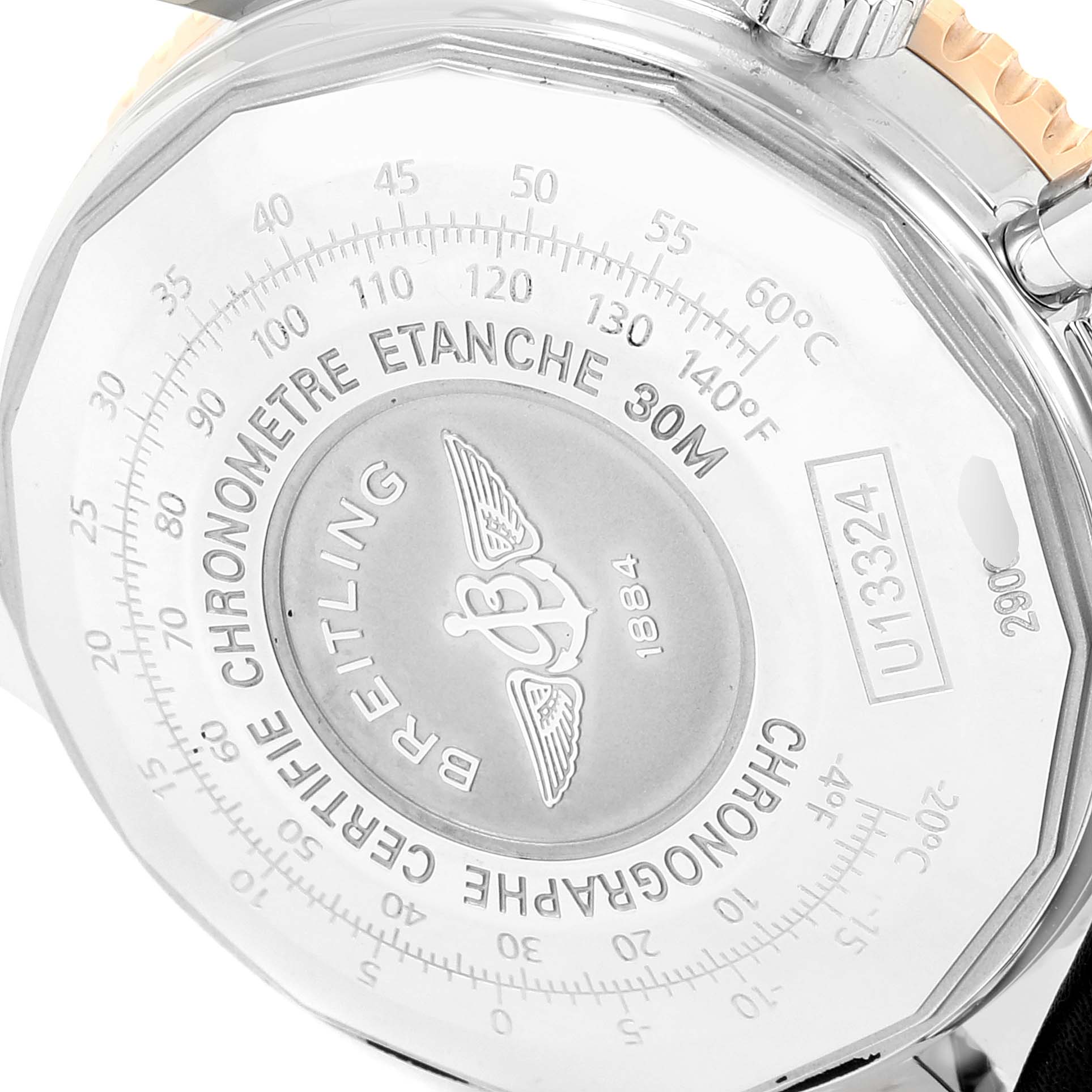 The image shows the back case of a Breitling Navitimer U13324211B1X1 Men
s Steel and Gold (two tone) Black Dial U13324211B1X1 Men
s Steel and Gold (two tone) Black Dial watch, highlighting its engravings and detailing.