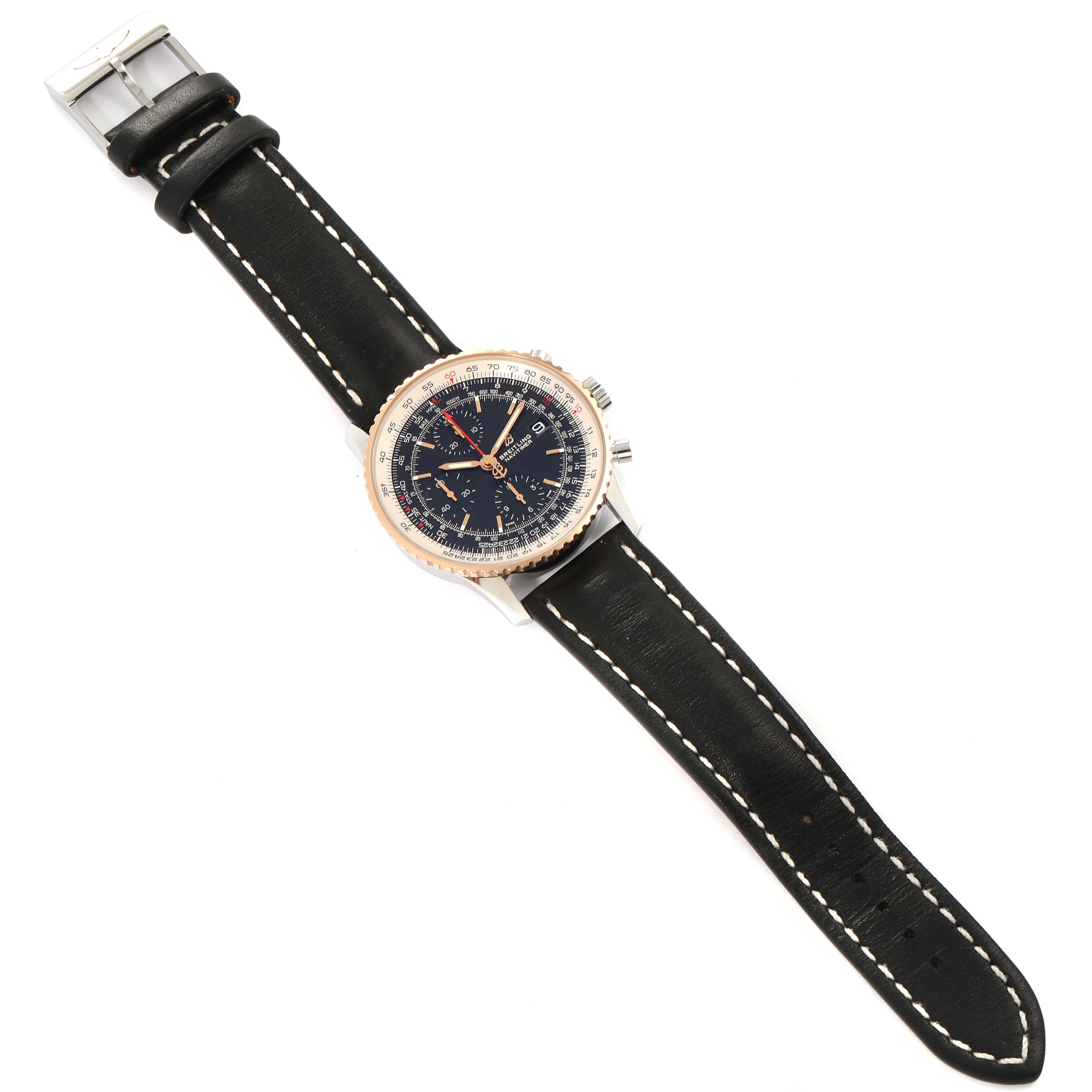 The image shows a full view of a Breitling Navitimer U13324211B1X1 Men
s Steel and Gold (two tone) Black Dial U13324211B1X1 Men
s Steel and Gold (two tone) Black Dial watch, featuring its dial, bezel, case, and leather strap.