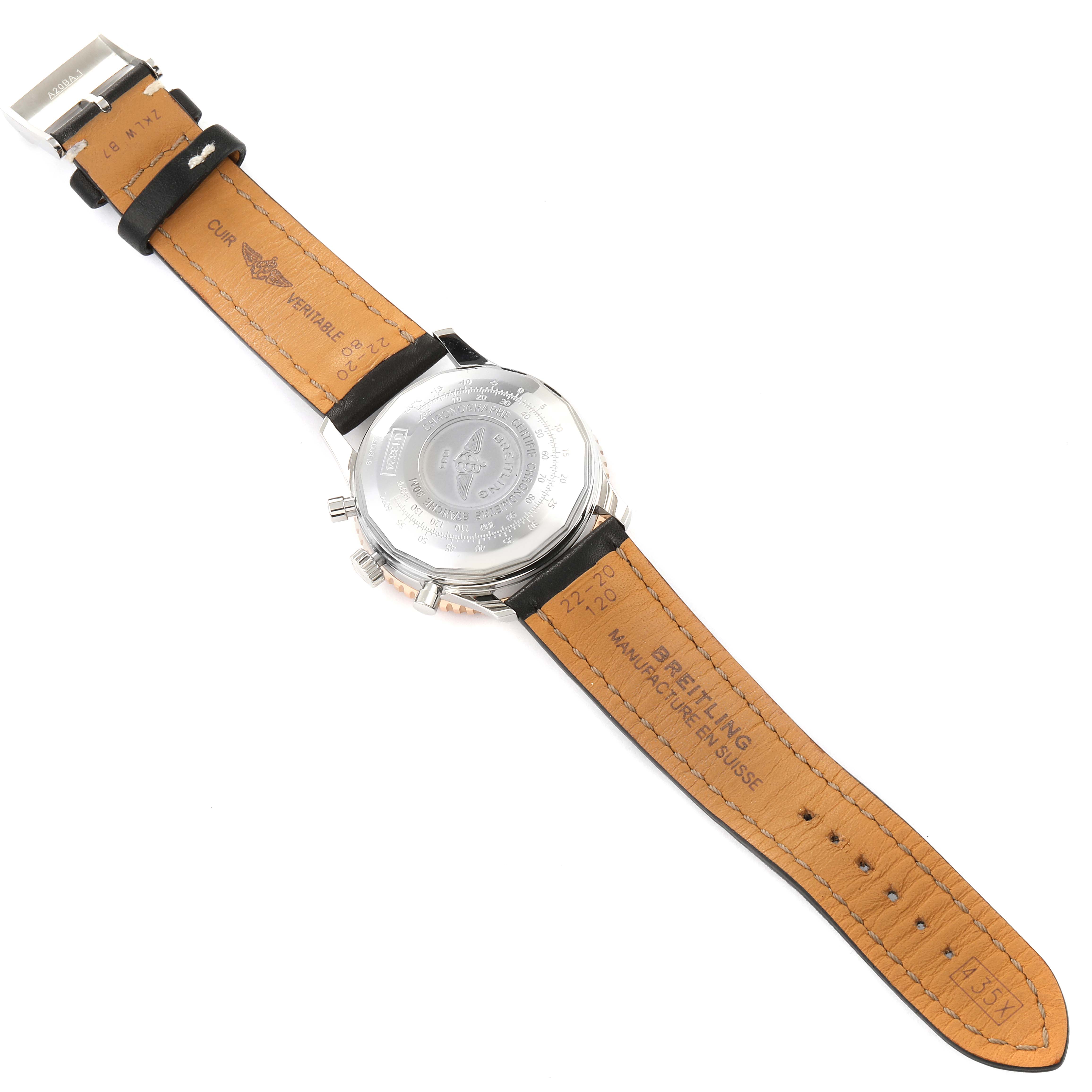 The image shows the back side of a Breitling Navitimer U13324211B1X1 Men
s Steel and Gold (two tone) Black Dial U13324211B1X1 Men
s Steel and Gold (two tone) Black Dial watch, highlighting the stainless steel case and leather strap.