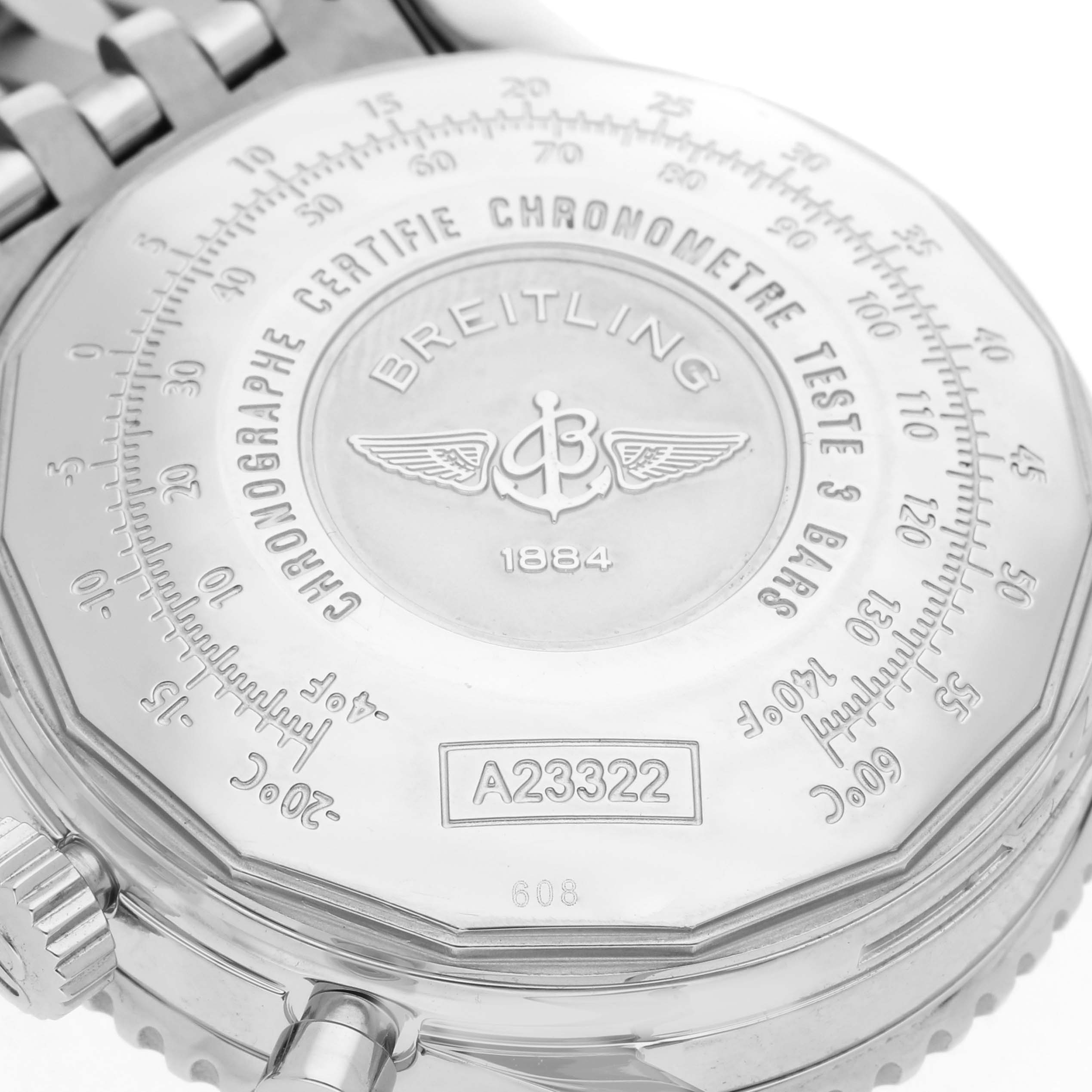 The image shows the back case of a Breitling Navitimer A23322 Men
s Stainless Steel Blue Dial A23322 Men
s Stainless Steel Blue Dial, highlighting the engraved logo, text, and model number.