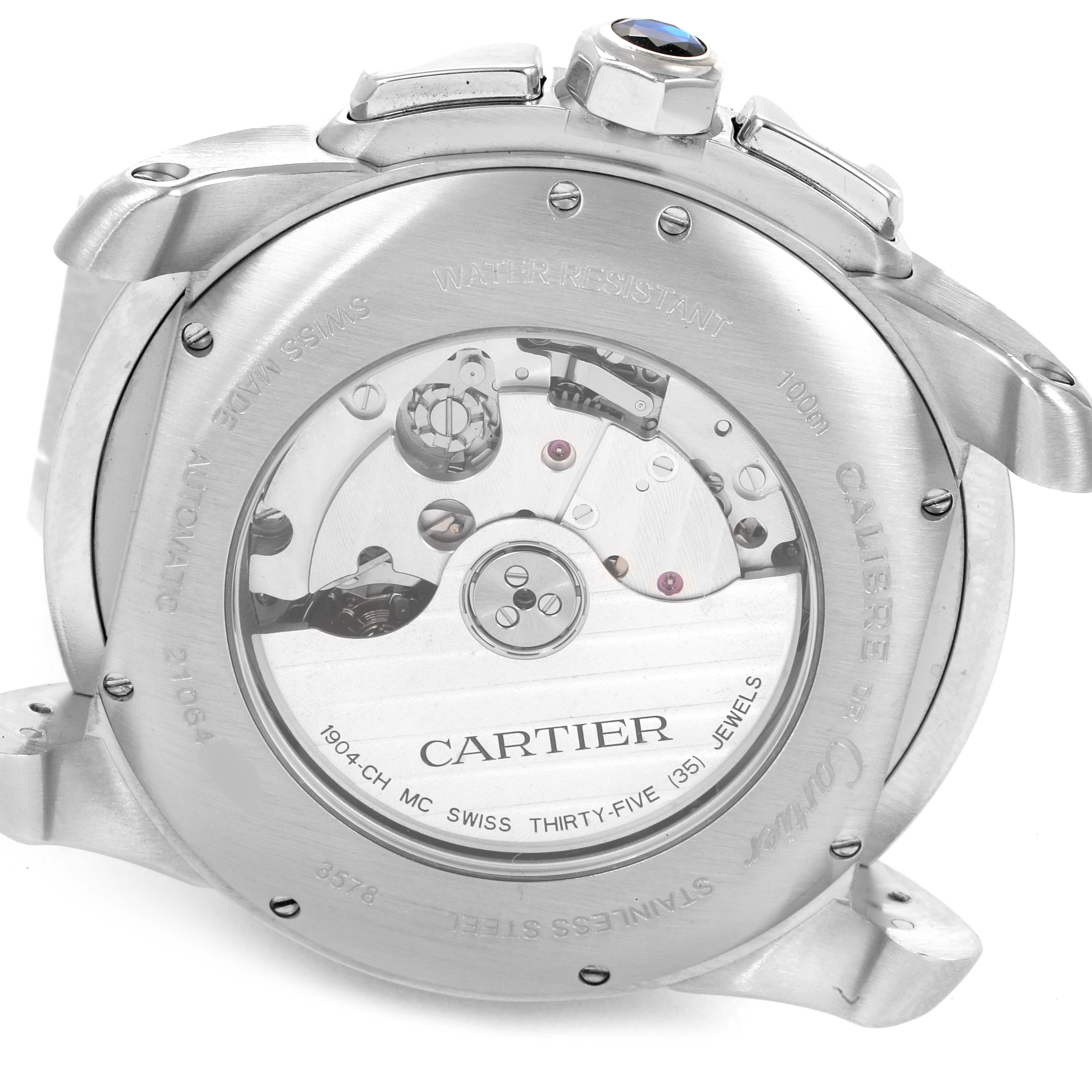 This image shows the back view of the Calibre de Cartier model by Cartier, highlighting the watch
s internal mechanism.