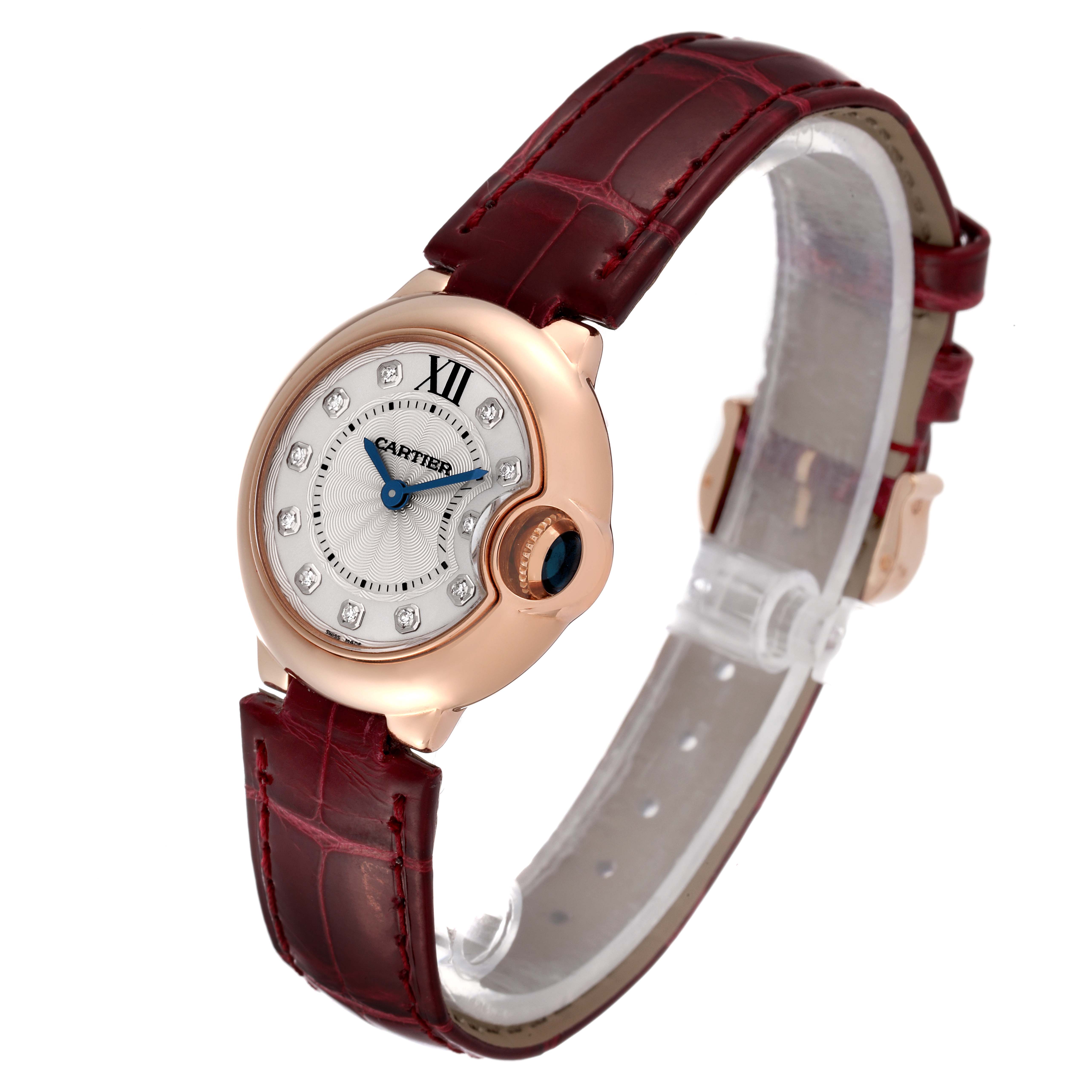 This image shows a Cartier Ballon Bleu WE902050 Women
s Rose Gold Silver Dial WE902050 Women
s Rose Gold Silver Dial watch angled from the front and right side, displaying the face, bezel, and leather strap.