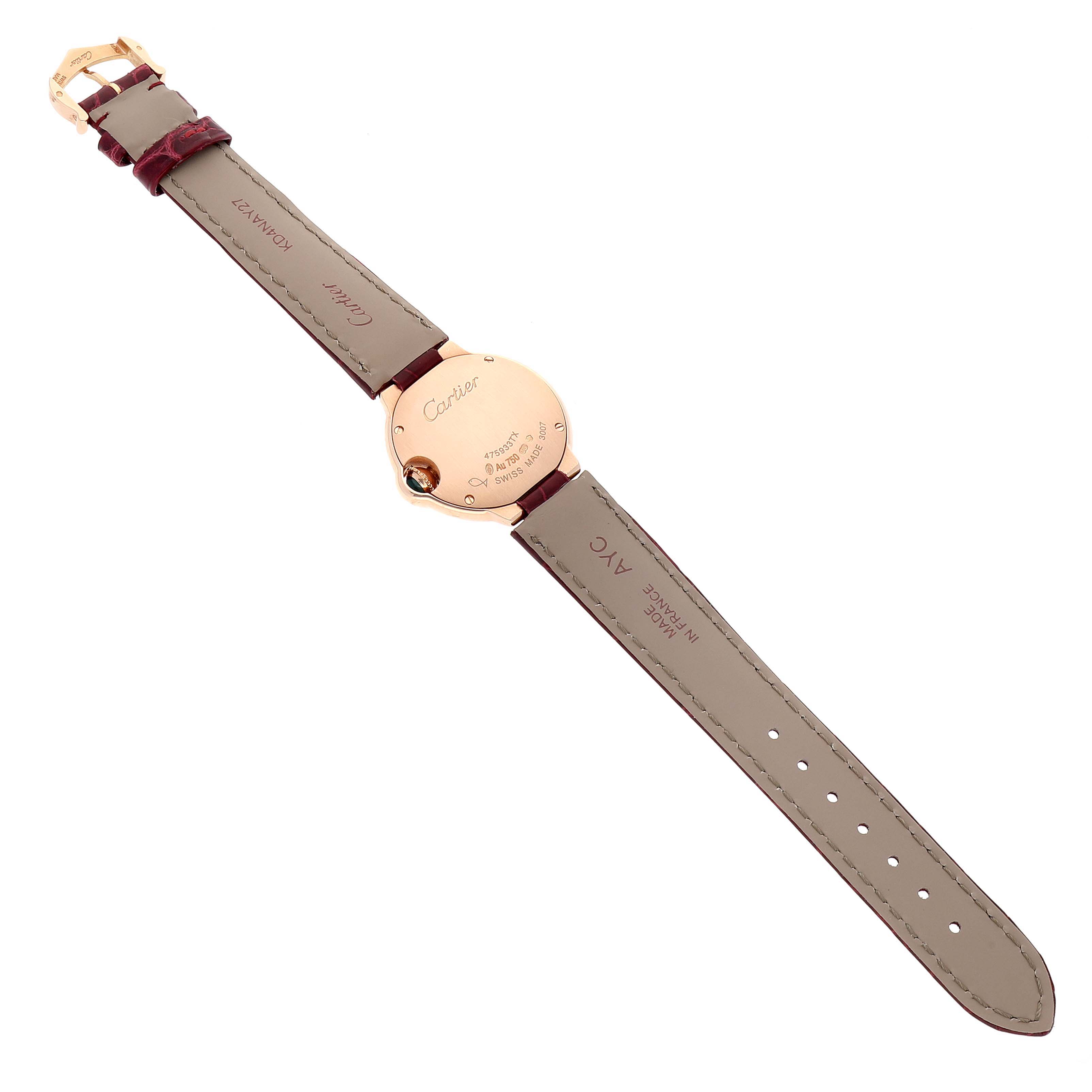 The image shows the back and strap of a Ballon Bleu model by Cartier, laid flat.