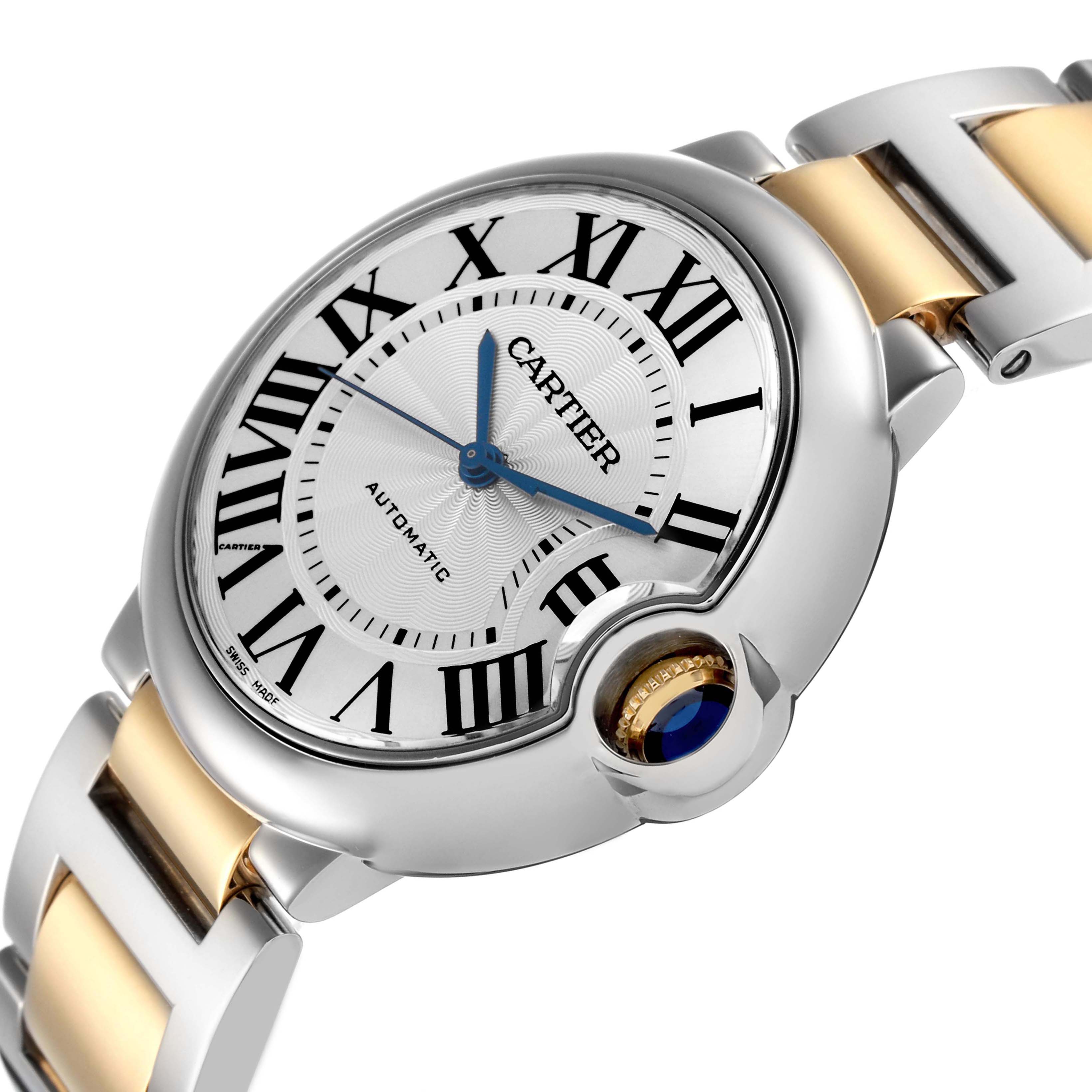 The Ballon Bleu by Cartier is shown at an angle highlighting its dial, crown with blue cabochon, and part of the bracelet.