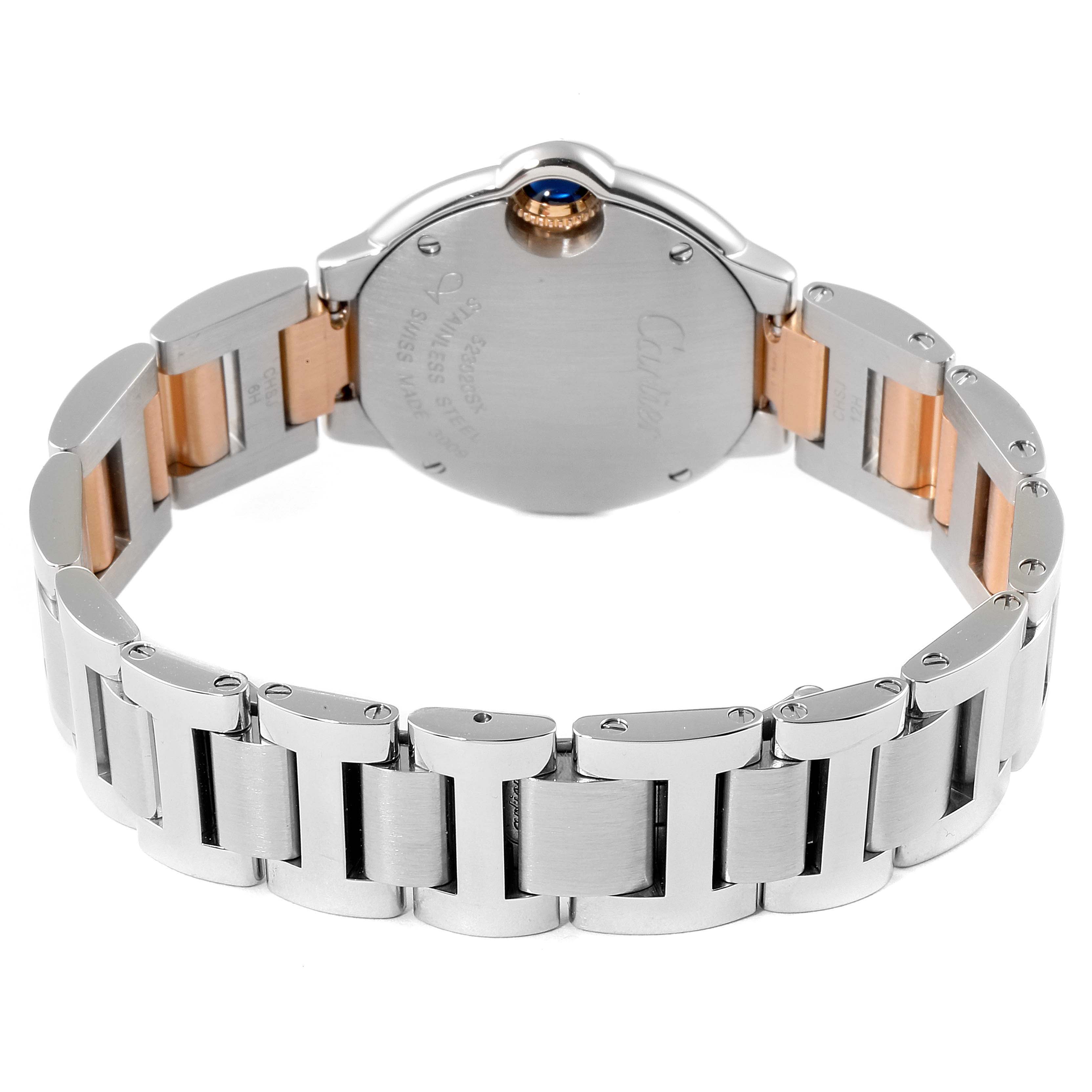 The image shows the back case and bracelet of the Cartier Ballon Bleu WE902030 Women's Steel and Gold (two tone) Silver Dial WE902030 Women's Steel and Gold (two tone) Silver Dial watch, viewed from a slightly elevated angle.