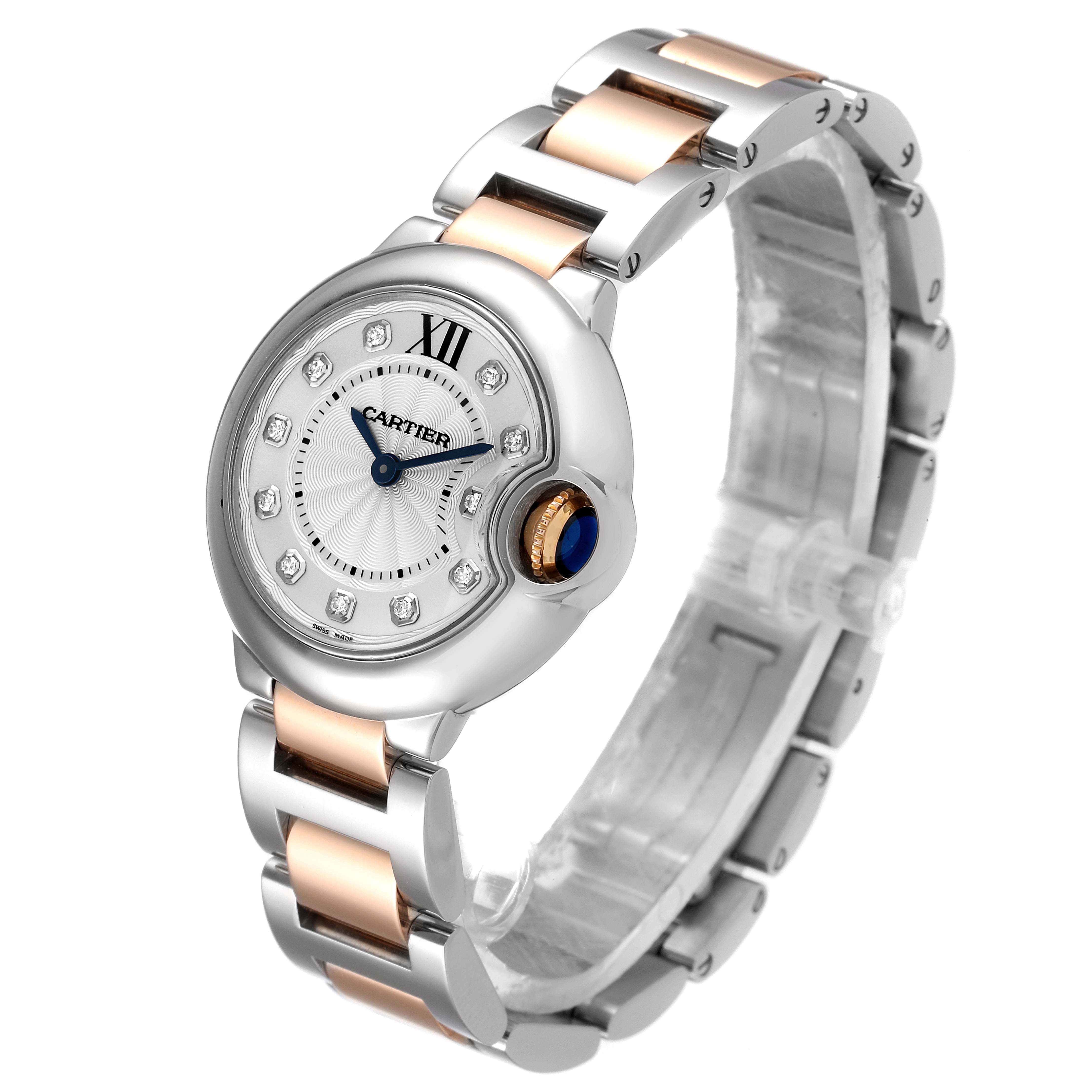 The image shows a Ballon Bleu model watch by Cartier from a front and side angle, highlighting the face, crown, and bracelet.