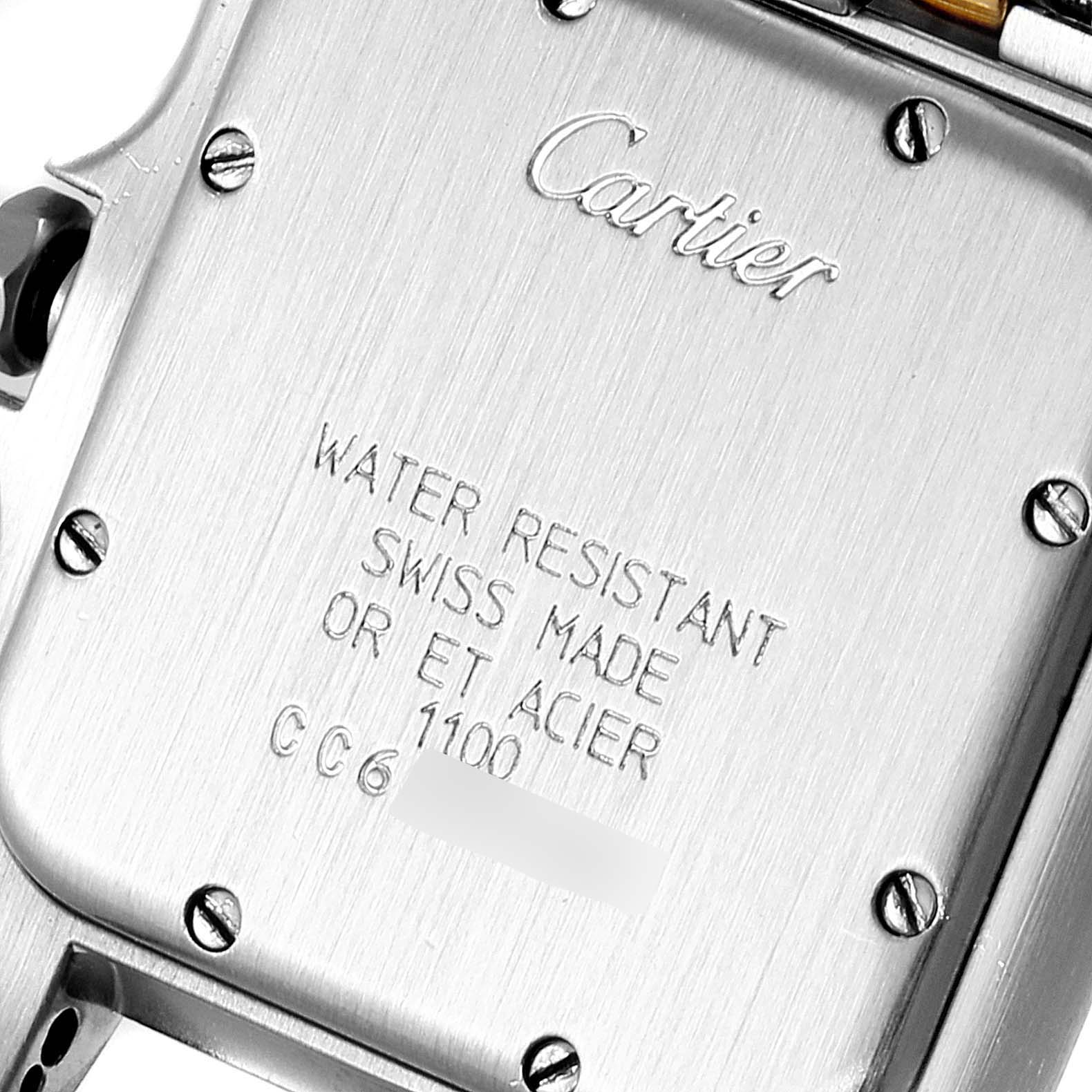 This image shows a close-up of the back case of a Cartier Panthere W25028B8 Men
s Steel and Gold (two tone) Silver Dial W25028B8 Men
s Steel and Gold (two tone) Silver Dial watch displaying its engravings and screws.