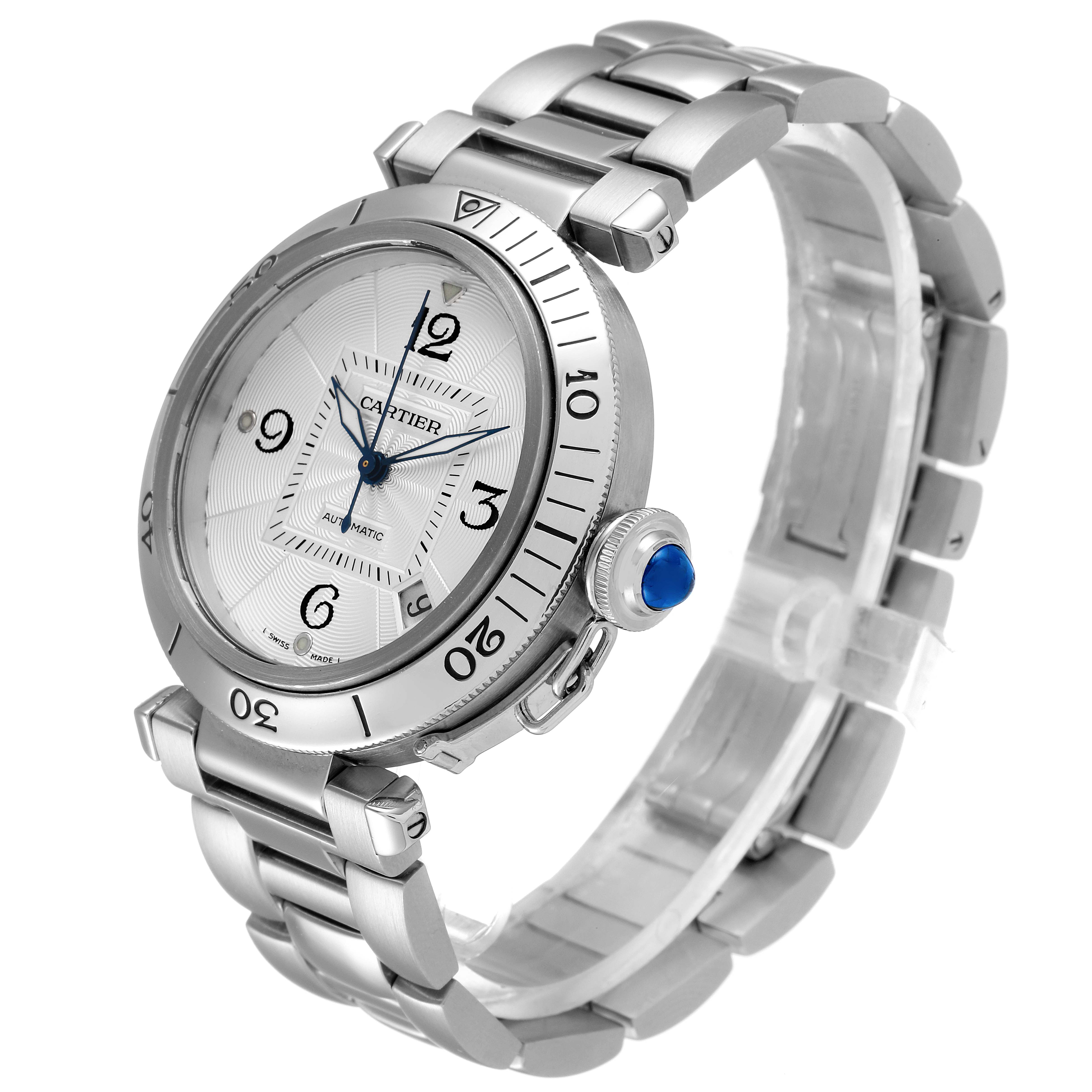 The Cartier Pasha W31059H3 Men
s Stainless Steel Silver Dial W31059H3 Men
s Stainless Steel Silver Dial watch is shown at a three-quarter angle, highlighting its face, bezel, crown with a blue cabochon, and metal bracelet.