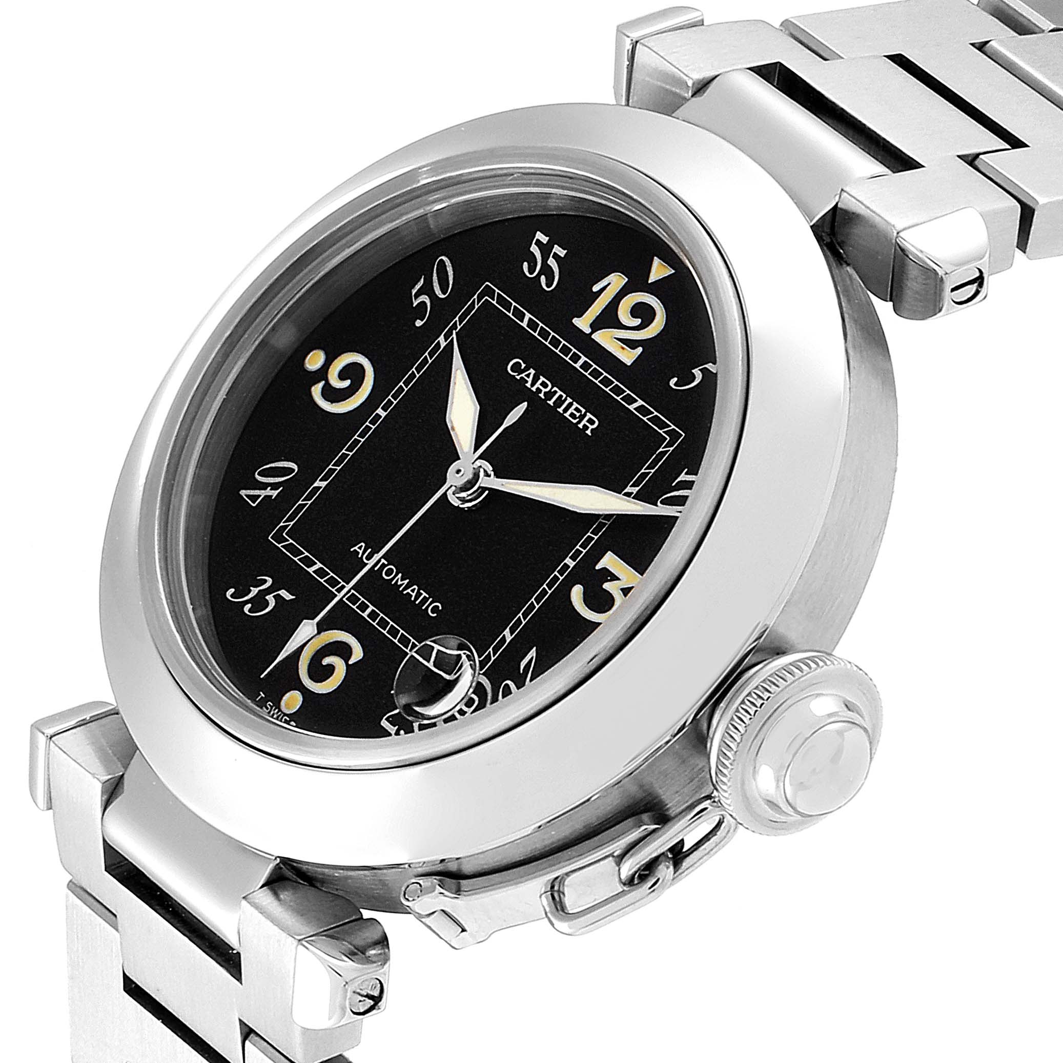 The image shows a close-up of the Cartier Pasha W31043M7 Men's Stainless Steel Black Dial W31043M7 Men's Stainless Steel Black Dial watch displaying its dial, crown, and part of its stainless steel bracelet.