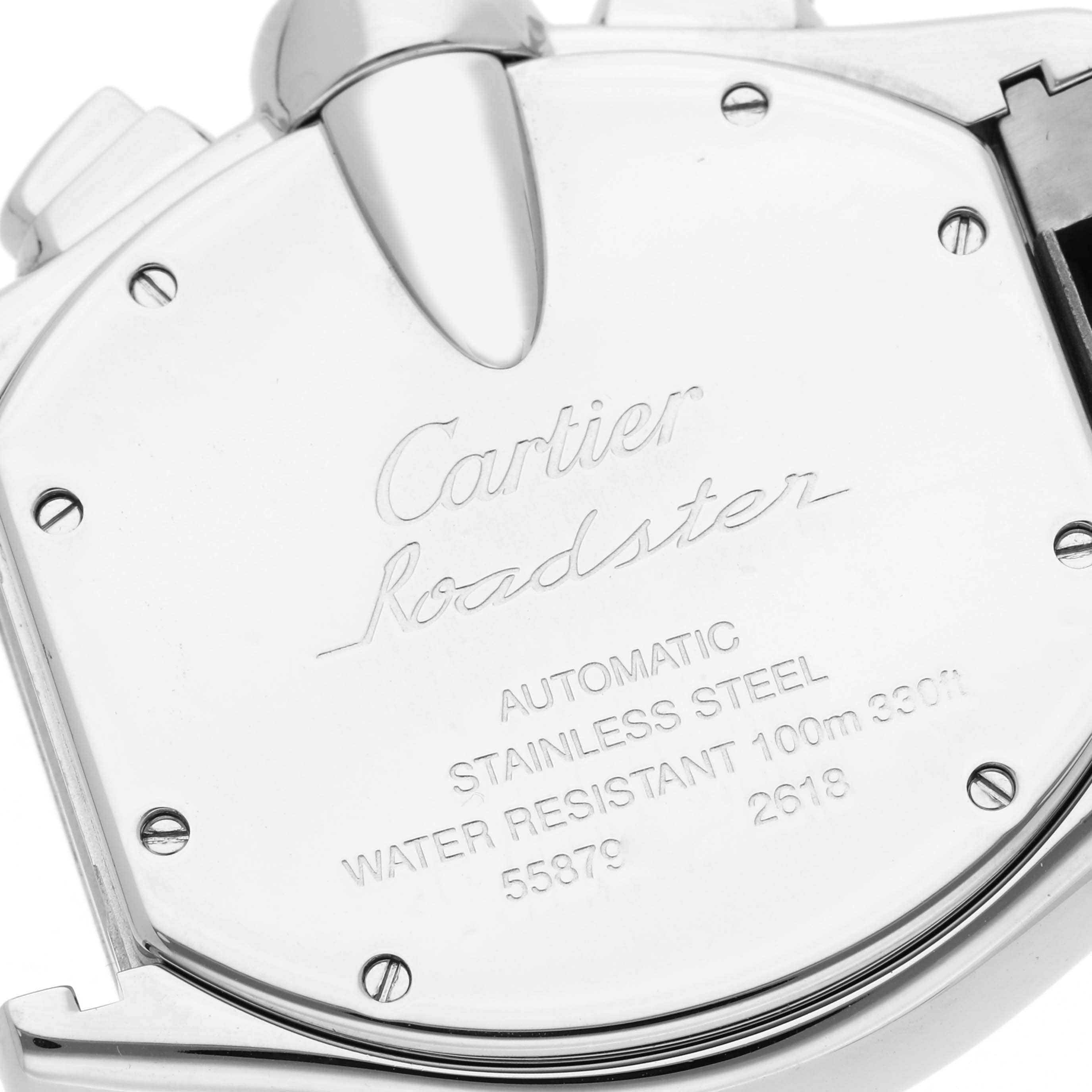 The image shows the back of a Cartier Roadster W62020X6 Men
s Stainless Steel Black Dial W62020X6 Men
s Stainless Steel Black Dial watch, displaying engraving and screws.