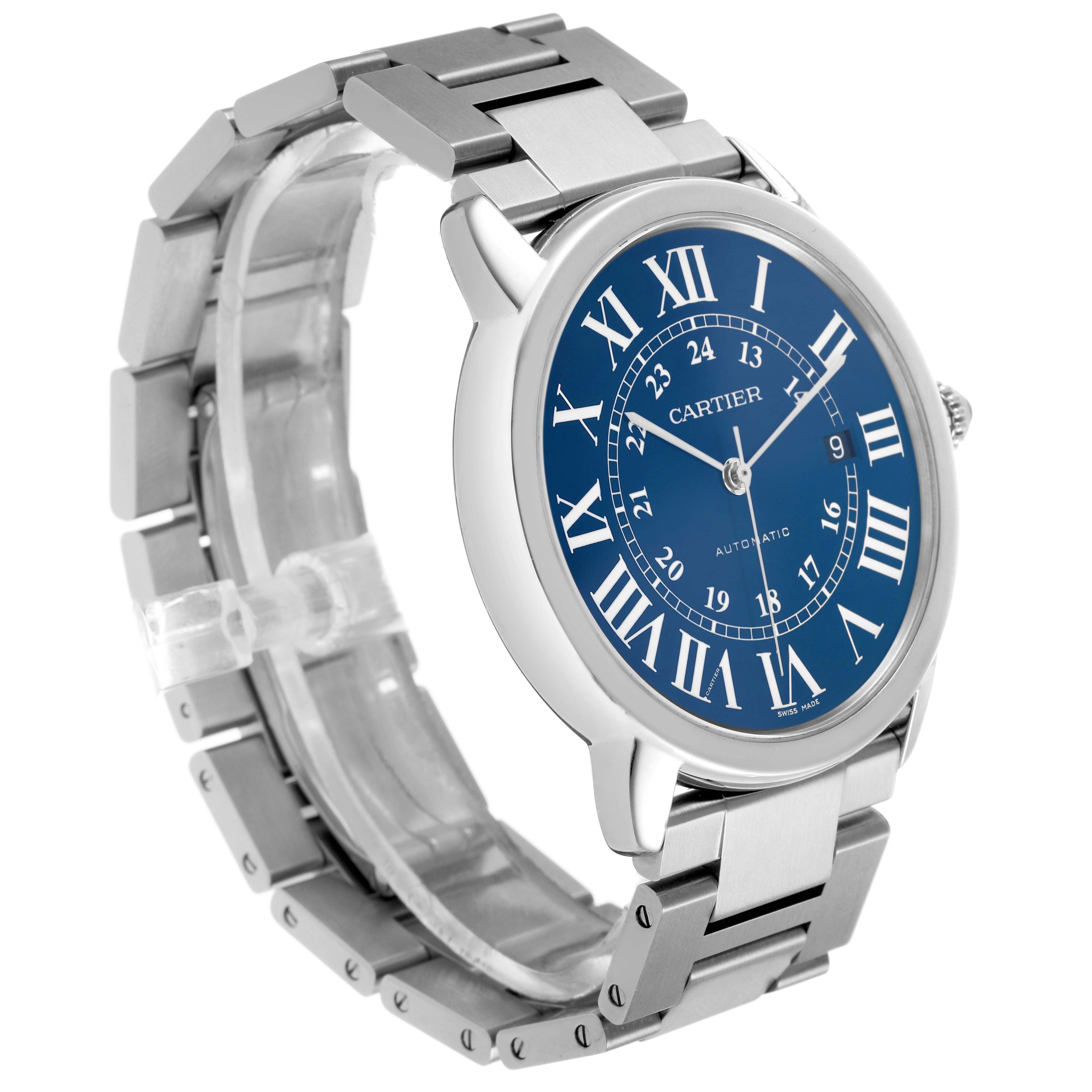 The Cartier Ronde WSRN0023 Men's Stainless Steel Blue Dial watch is shown at a three-quarter angle, highlighting its blue dial, Roman numerals, and stainless steel bracelet.