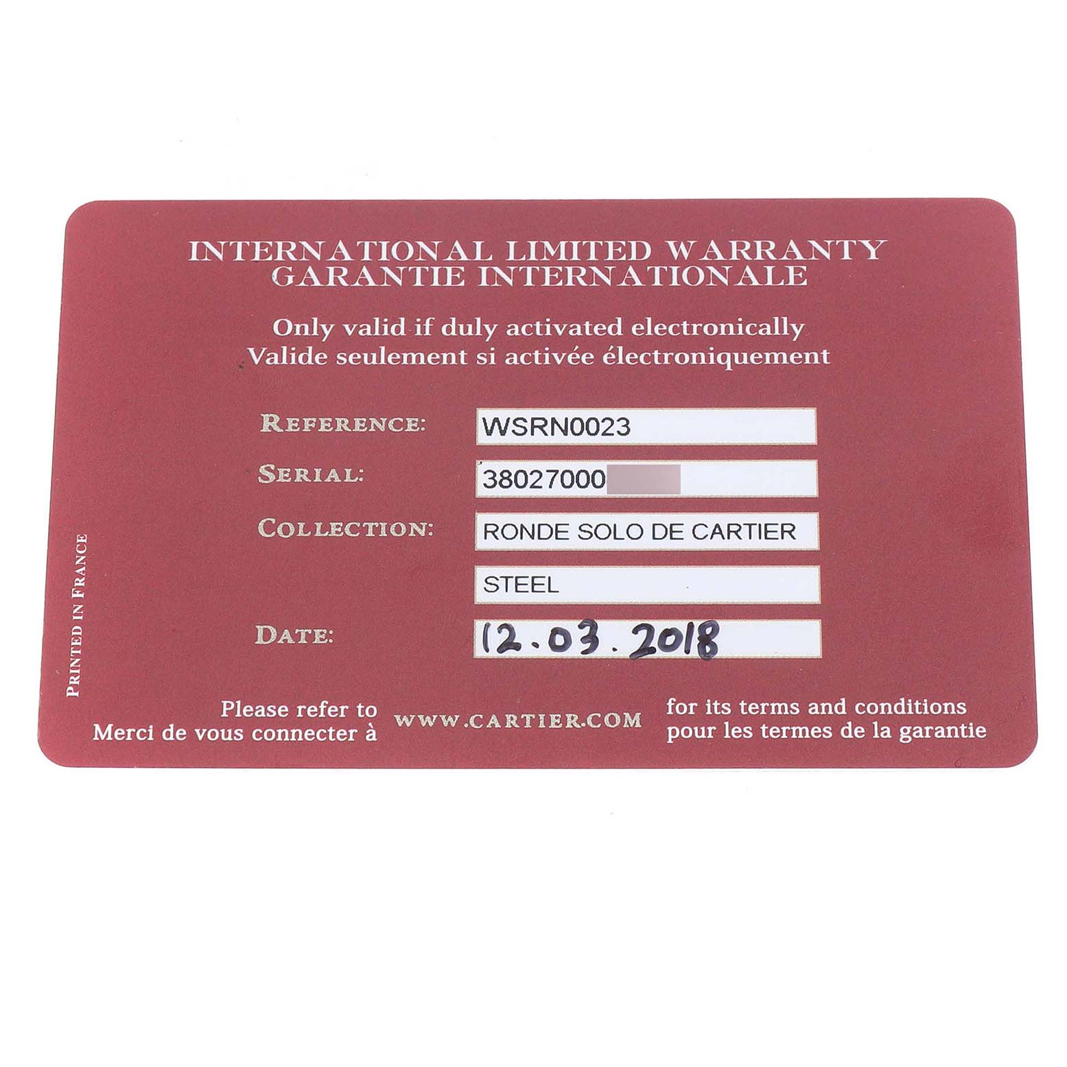 This image shows a Cartier Ronde WSRN0023 Men's Stainless Steel Blue Dial model warranty card with reference, serial number, collection, material, and date.