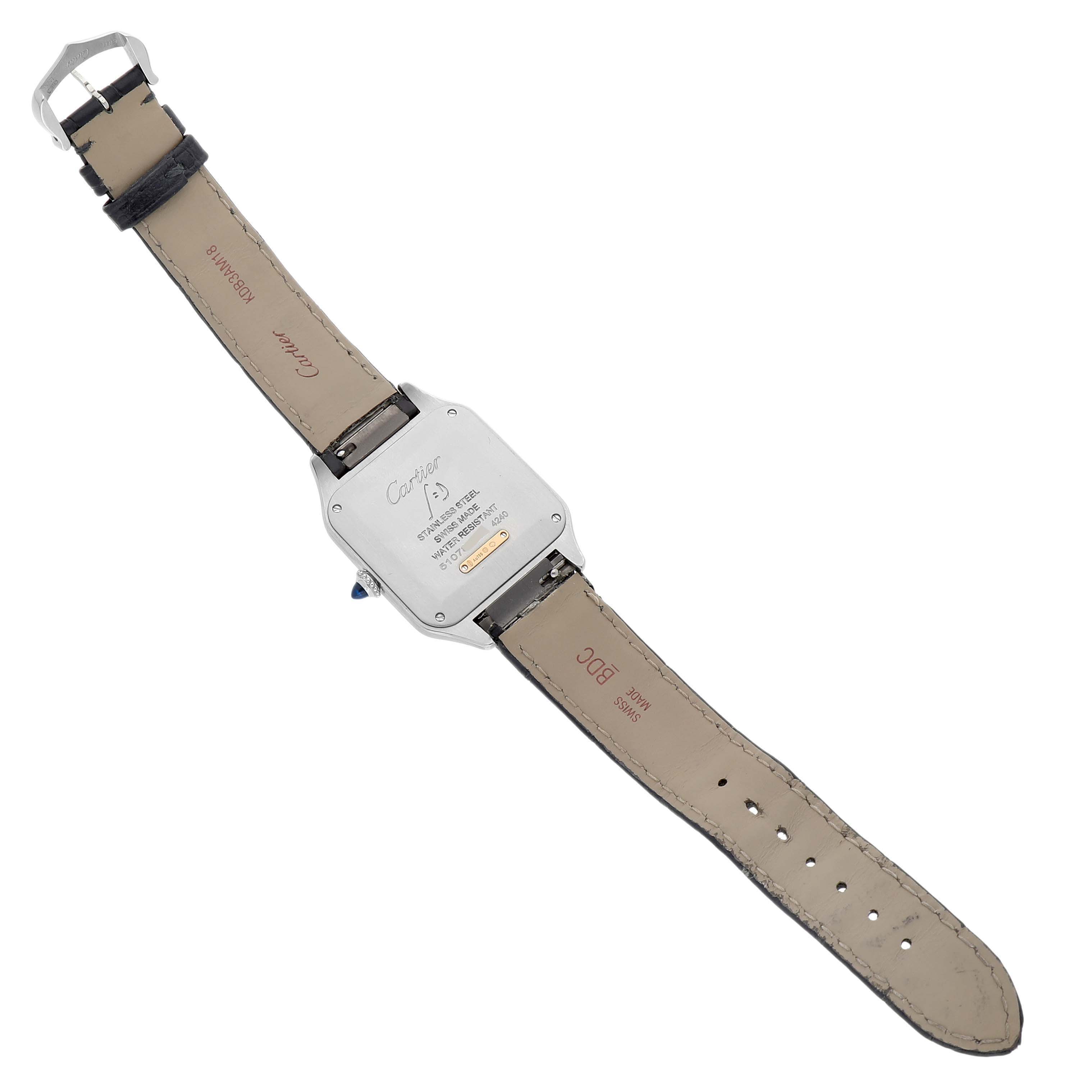 The image shows the back of the Cartier Santos Dumont W2SA0028 Men's Steel and Gold (two tone) Grey Dial watch, highlighting its case back and leather strap.