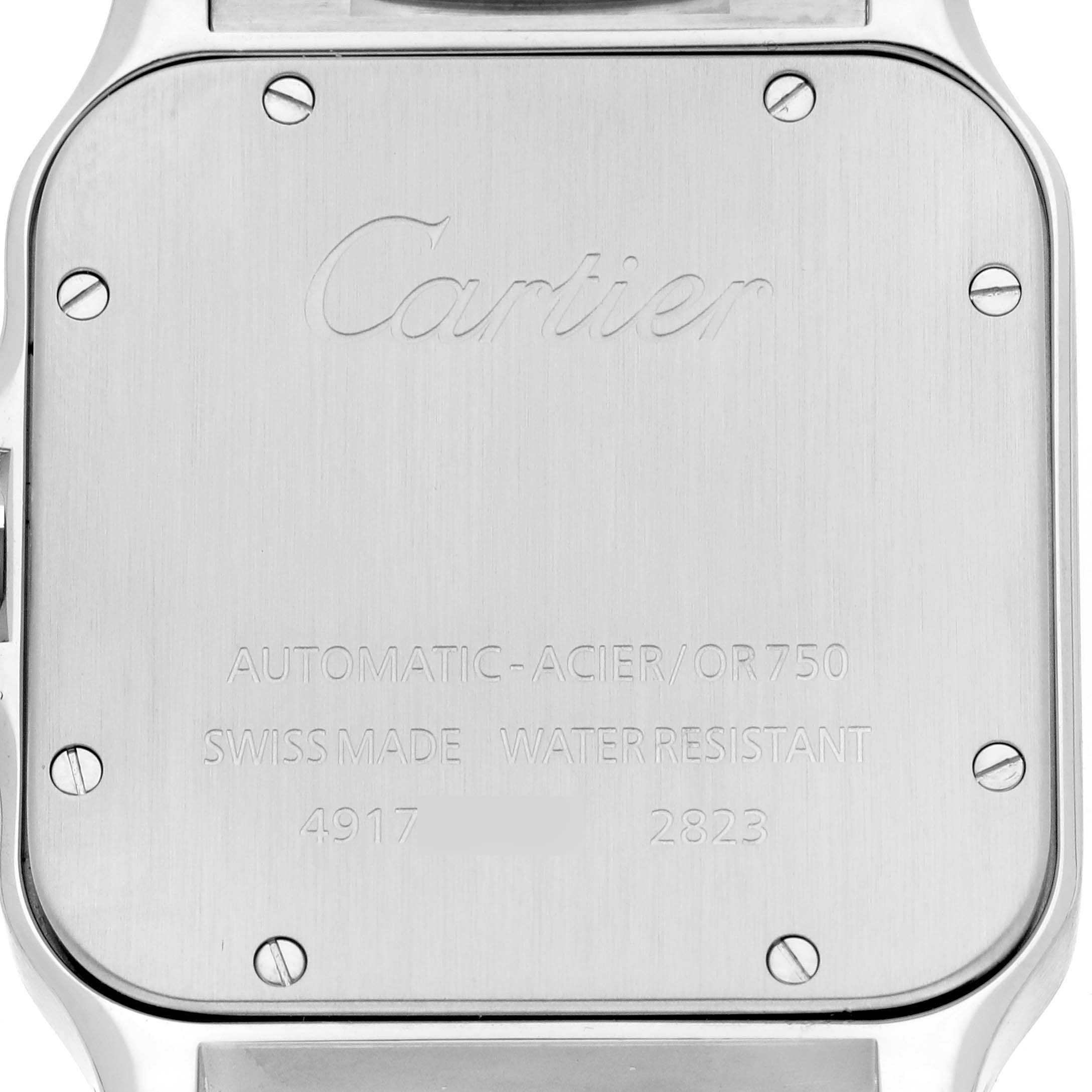 The image shows the back case of a Cartier Santos W20099C4 Men
s Steel and Gold (two tone) Silver Dial W20099C4 Men
s Steel and Gold (two tone) Silver Dial watch, featuring engravings and screws.