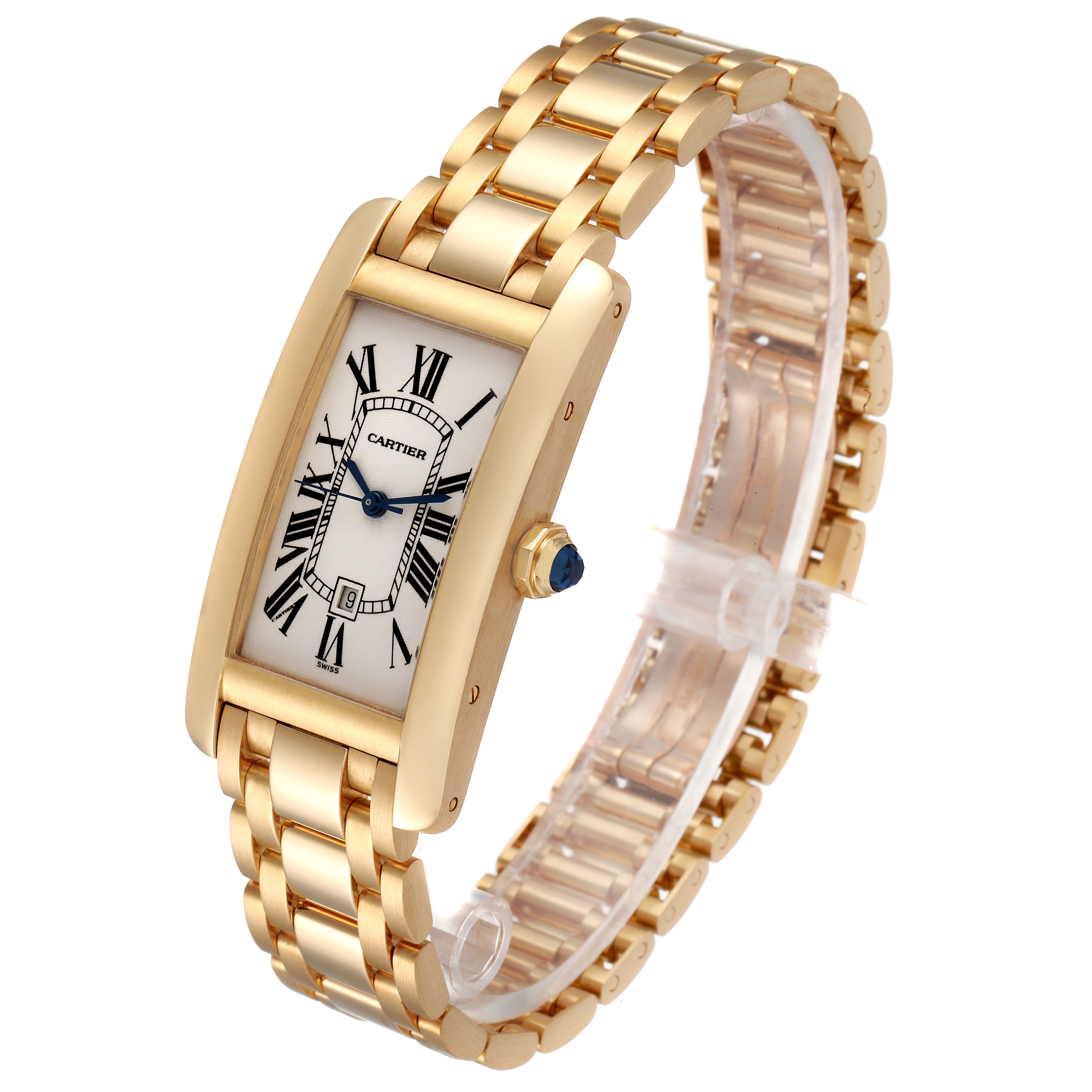 The Cartier Tank Americaine W26035K2 Women's Yellow Gold Silver Dial W26035K2 Women's Yellow Gold Silver Dial watch is shown at an angled view, highlighting its gold rectangular case, bracelet, and blue sapphire crown.