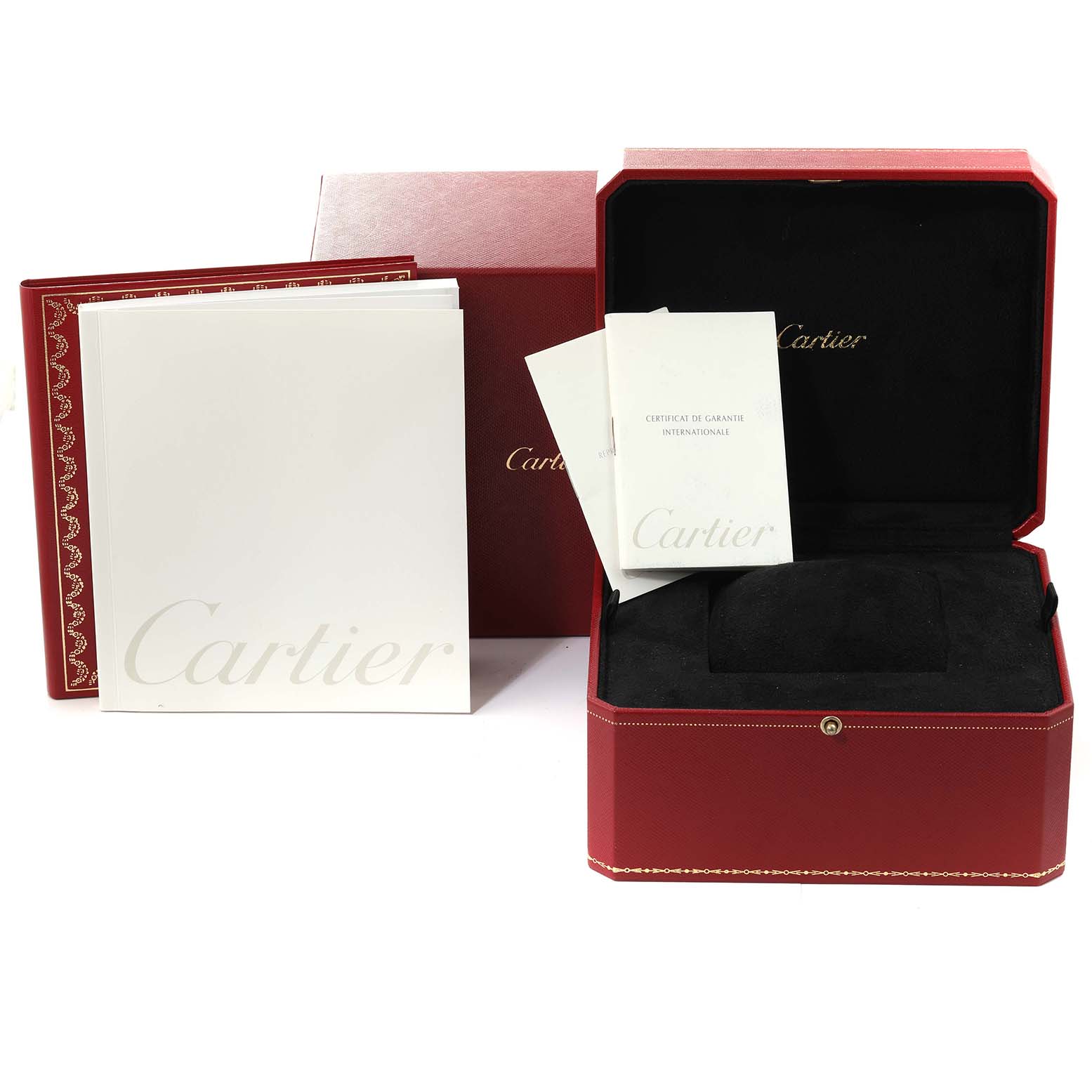 This image shows the packaging and documents for a Cartier Tank Americaine WB7018L1 Women's White Gold Silver Dial WB7018L1 Women's White Gold Silver Dial watch, including the red box, manuals, and booklets.