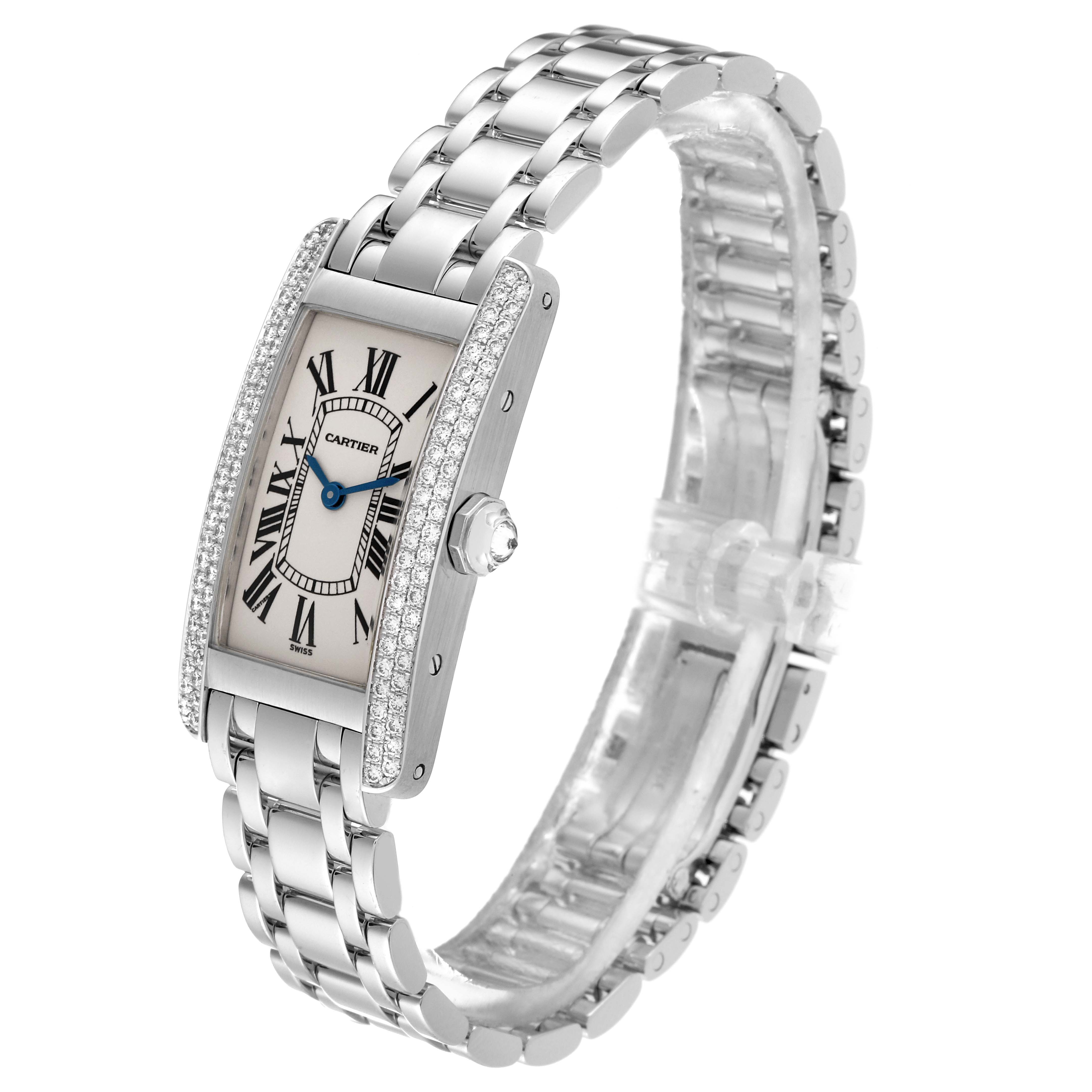 This image shows a side angle of the Cartier Tank Americaine WB7018L1 Women's White Gold Silver Dial WB7018L1 Women's White Gold Silver Dial watch, highlighting its rectangular face, stainless steel bracelet, and diamond-set bezel.