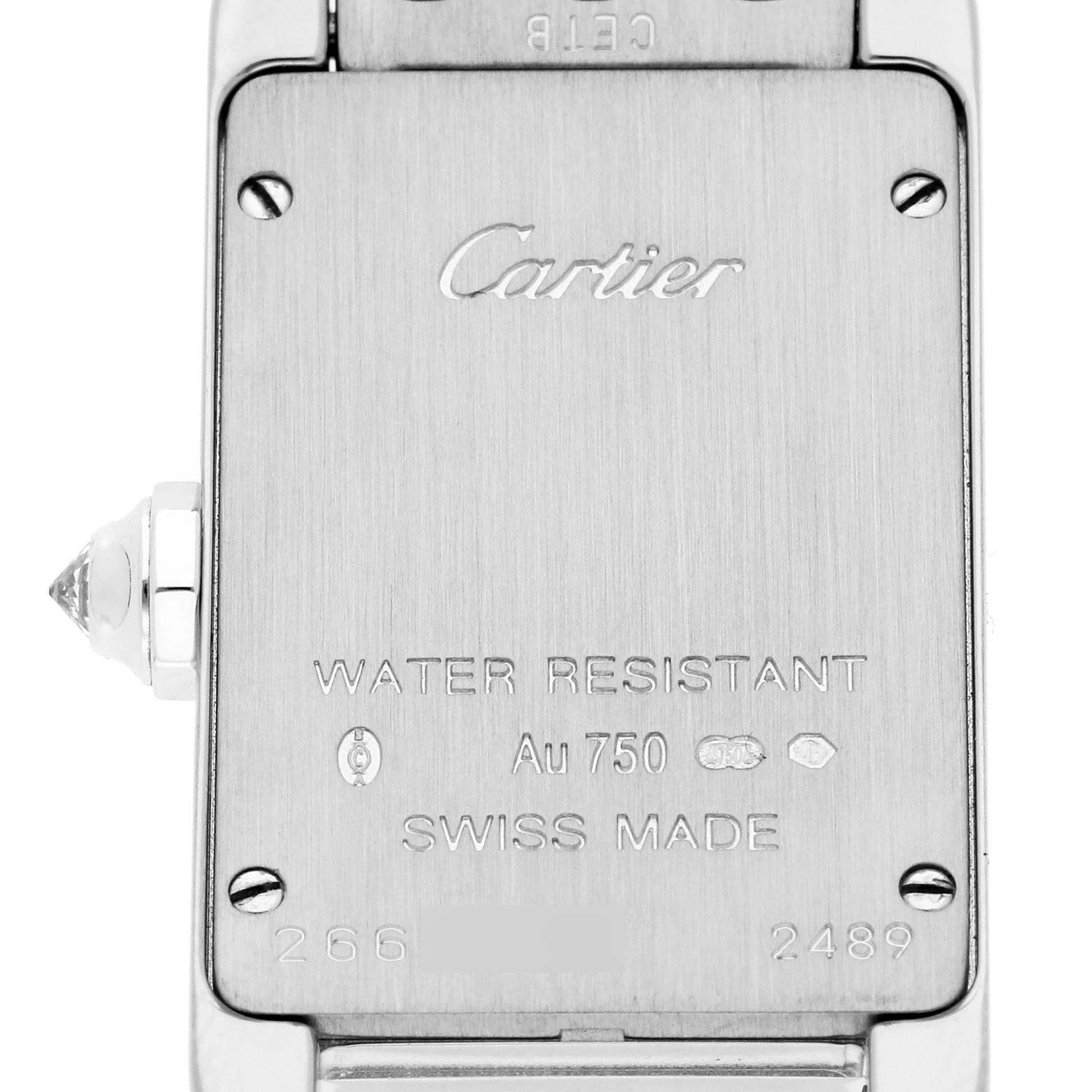 This angle shows the back case of the Cartier Tank Americaine WB710009 Women's White Gold Silver Dial WB710009 Women's White Gold Silver Dial watch, highlighting the brand logo, water resistance, and material details.