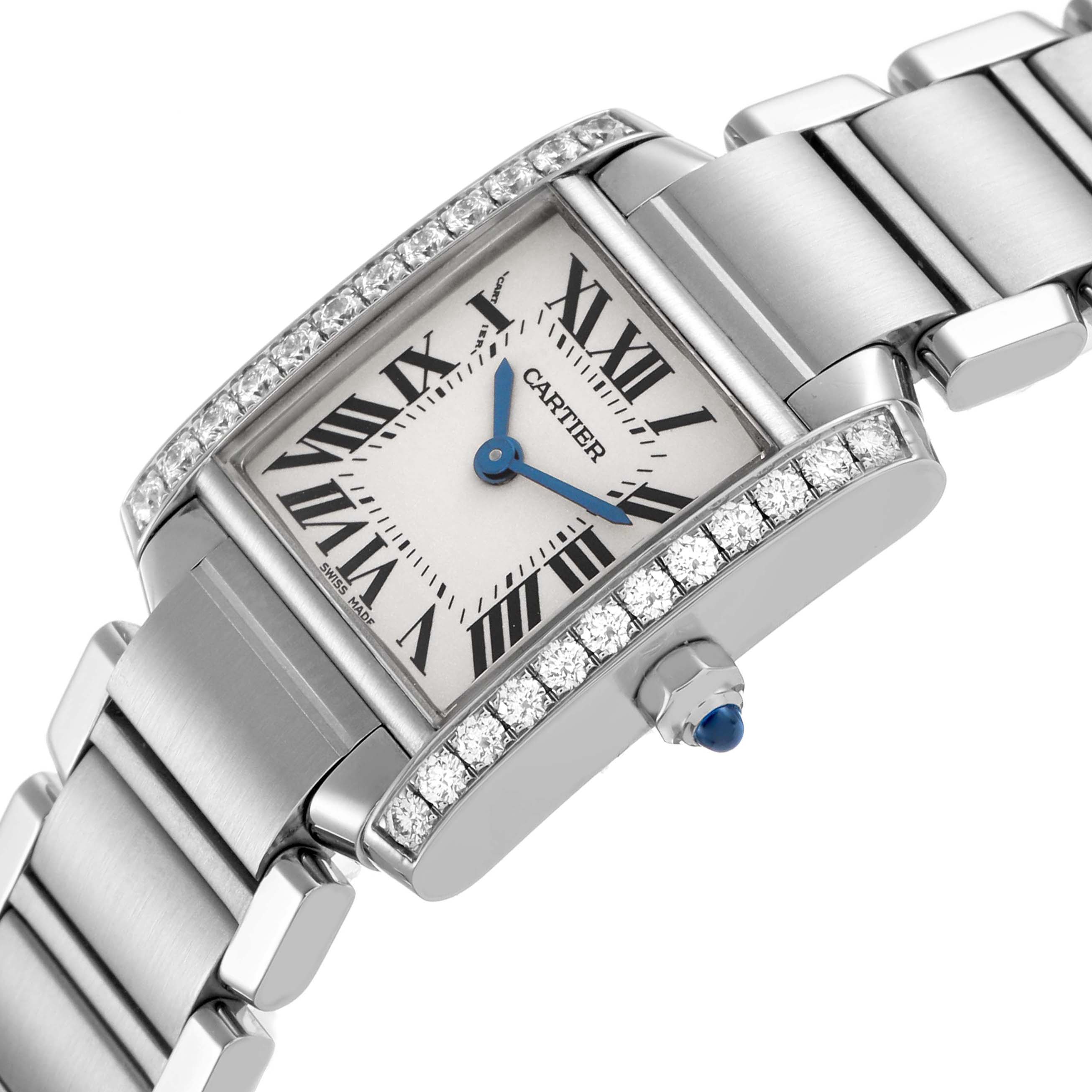 The Cartier Tank Francaise W4TA0008 Women's Stainless Steel Silver Dial watch is shown at an angled view, highlighting its face, diamond-set bezel, and part of the bracelet.