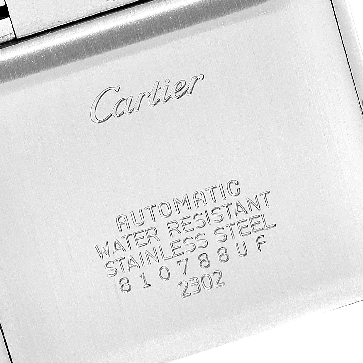 This image shows the back case of the Cartier Tank Française watch, displaying its engravings.