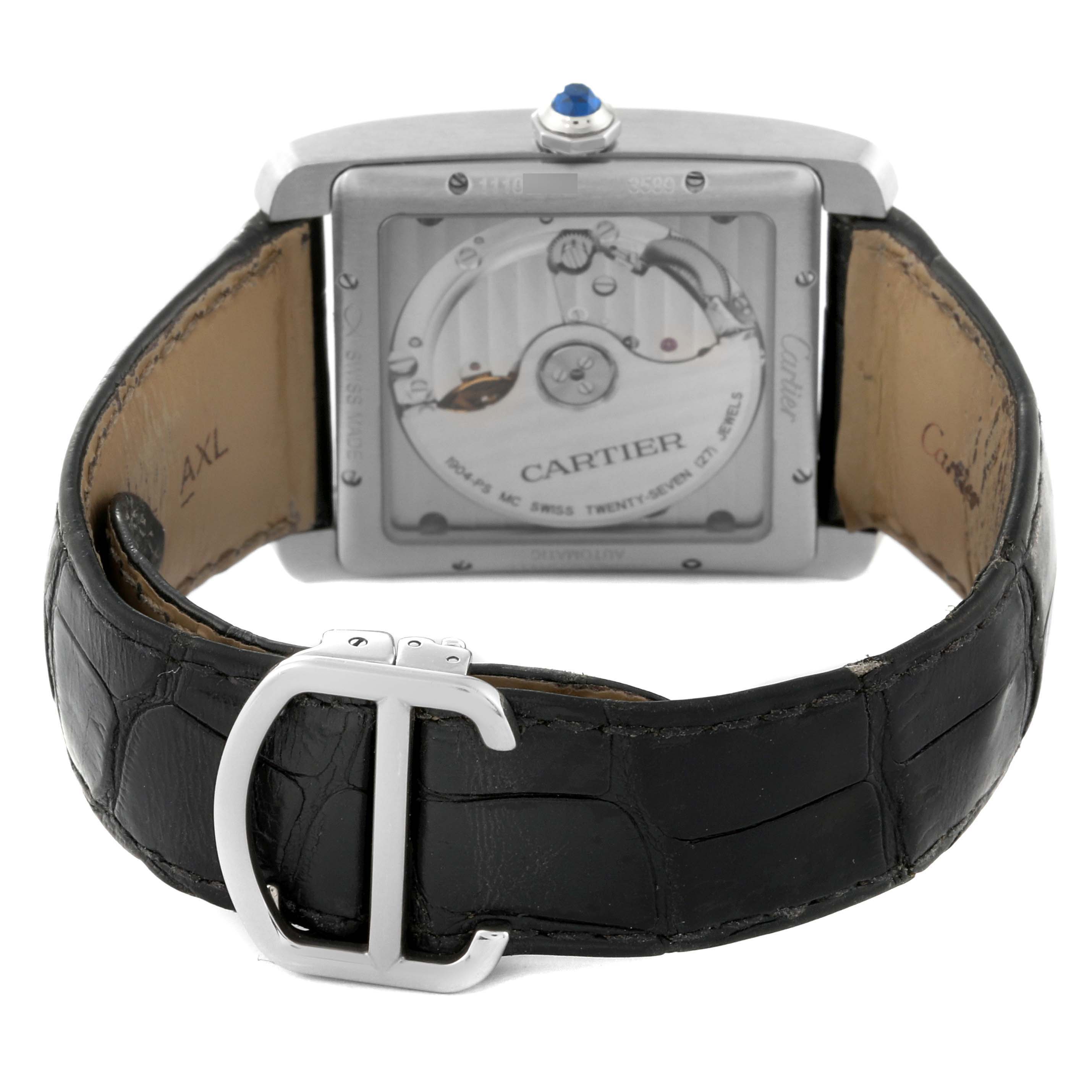 The image shows the back view of the Cartier Tank MC W5330003 Men's Stainless Steel Silver Dial W5330003 Men's Stainless Steel Silver Dial watch, highlighting the movement and black leather strap with a buckle.