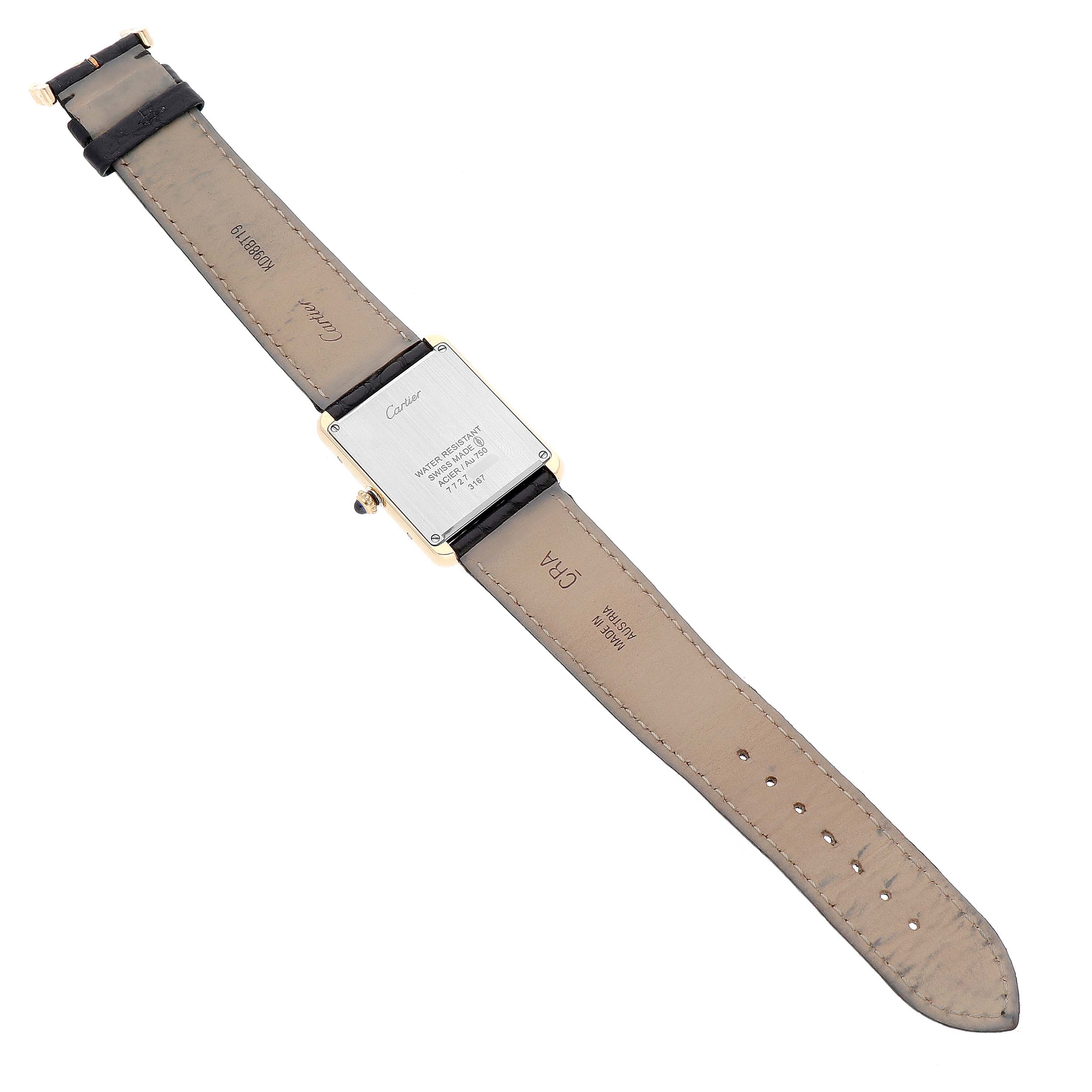 The Cartier Tank Solo W5200004 Men's Yellow Gold Silver Dial watch is shown from the back, displaying its case and leather strap.