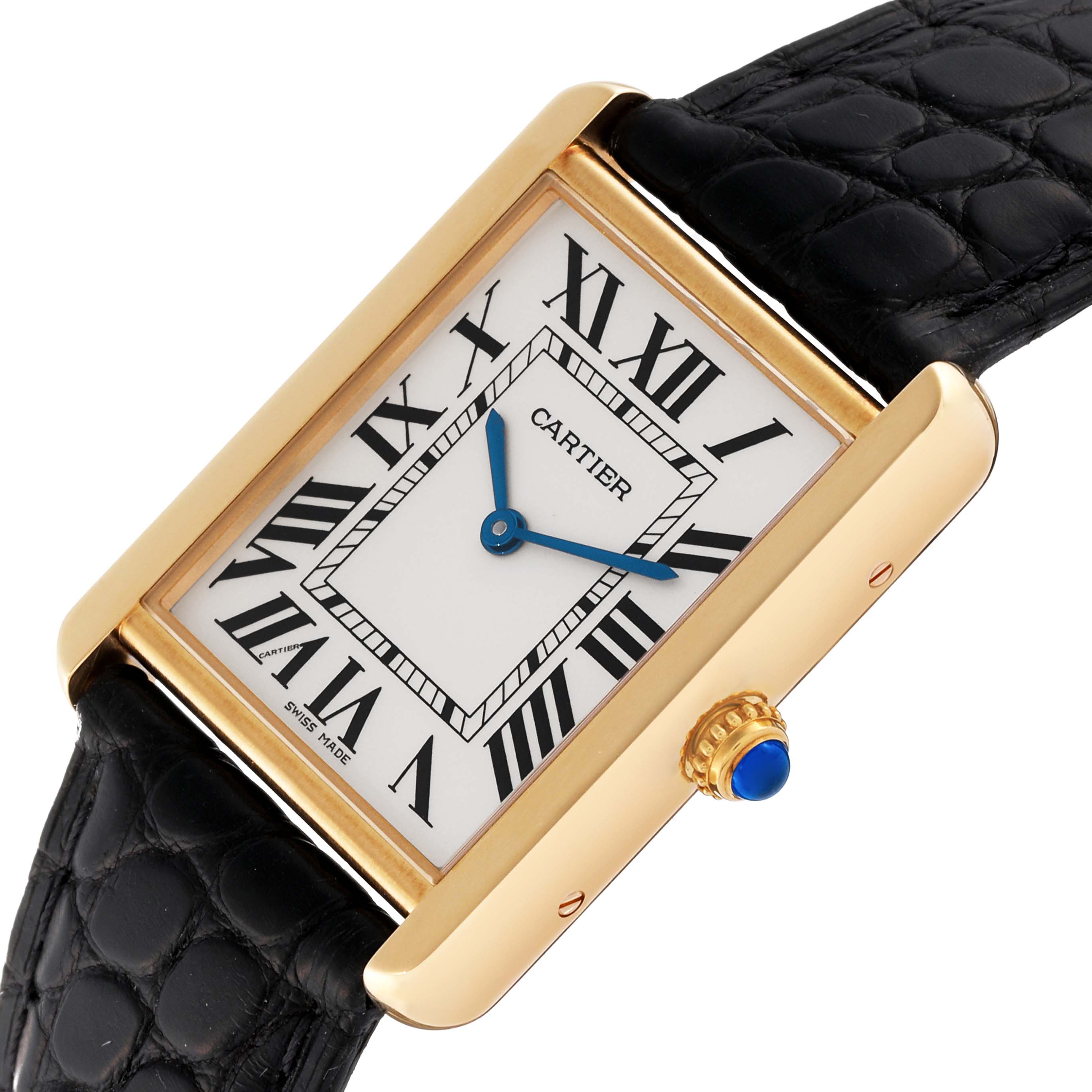 The Cartier Tank Solo W5200004 Men's Steel and Gold (two tone) Silver Dial W5200004 Men's Steel and Gold (two tone) Silver Dial watch is shown at a slight angle, displaying the rectangular face, black leather strap, and gold case.