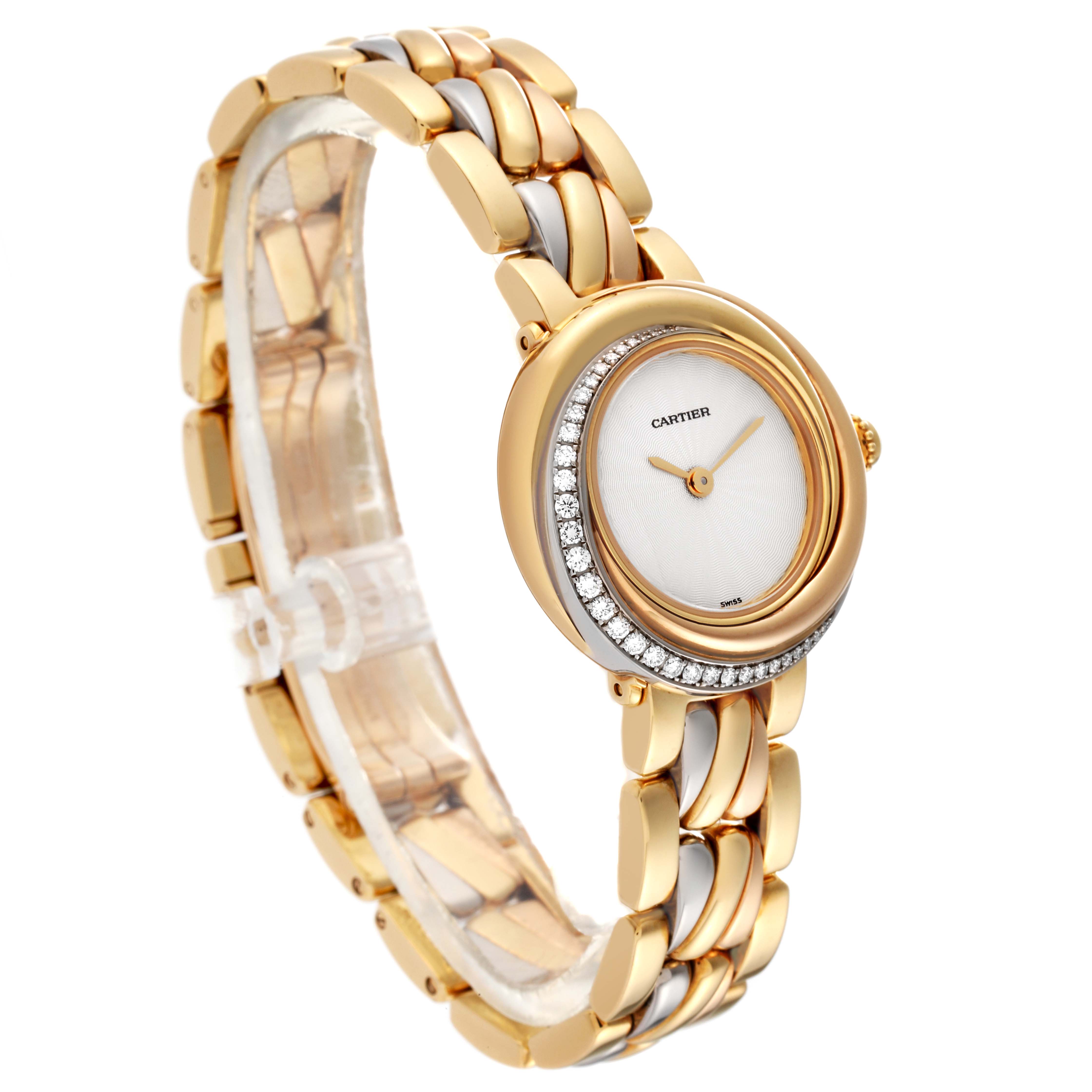 The Cartier Trinity WG200151 Women's Yellow Gold Silver Dial WG200151 Women's Yellow Gold Silver Dial model watch is shown at an angled view displaying its face, bezel, and band.