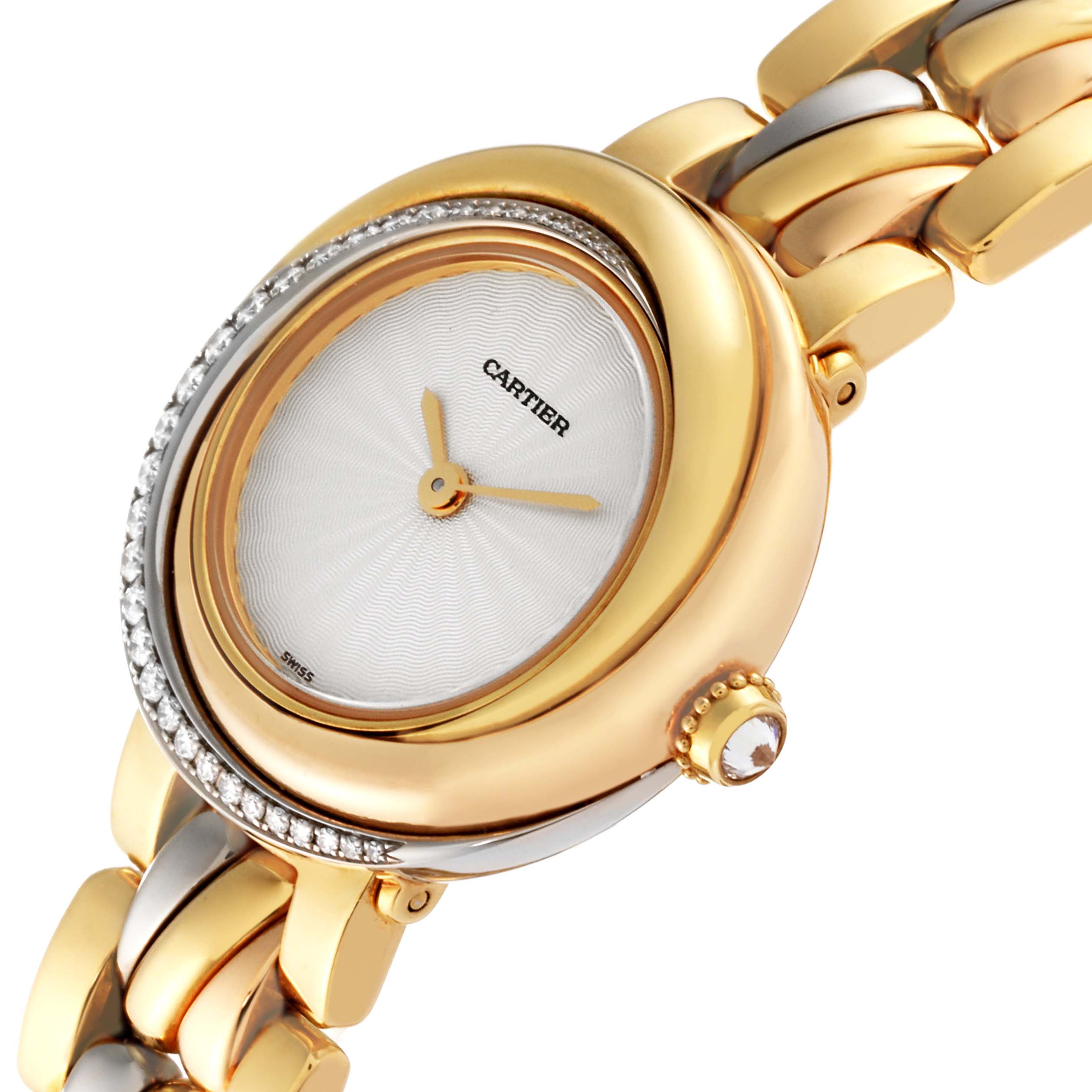 The Cartier Trinity WG200151 Women's Yellow Gold Silver Dial WG200151 Women's Yellow Gold Silver Dial model watch is shown at an angled close-up, highlighting its face, bezel, and part of the bracelet.