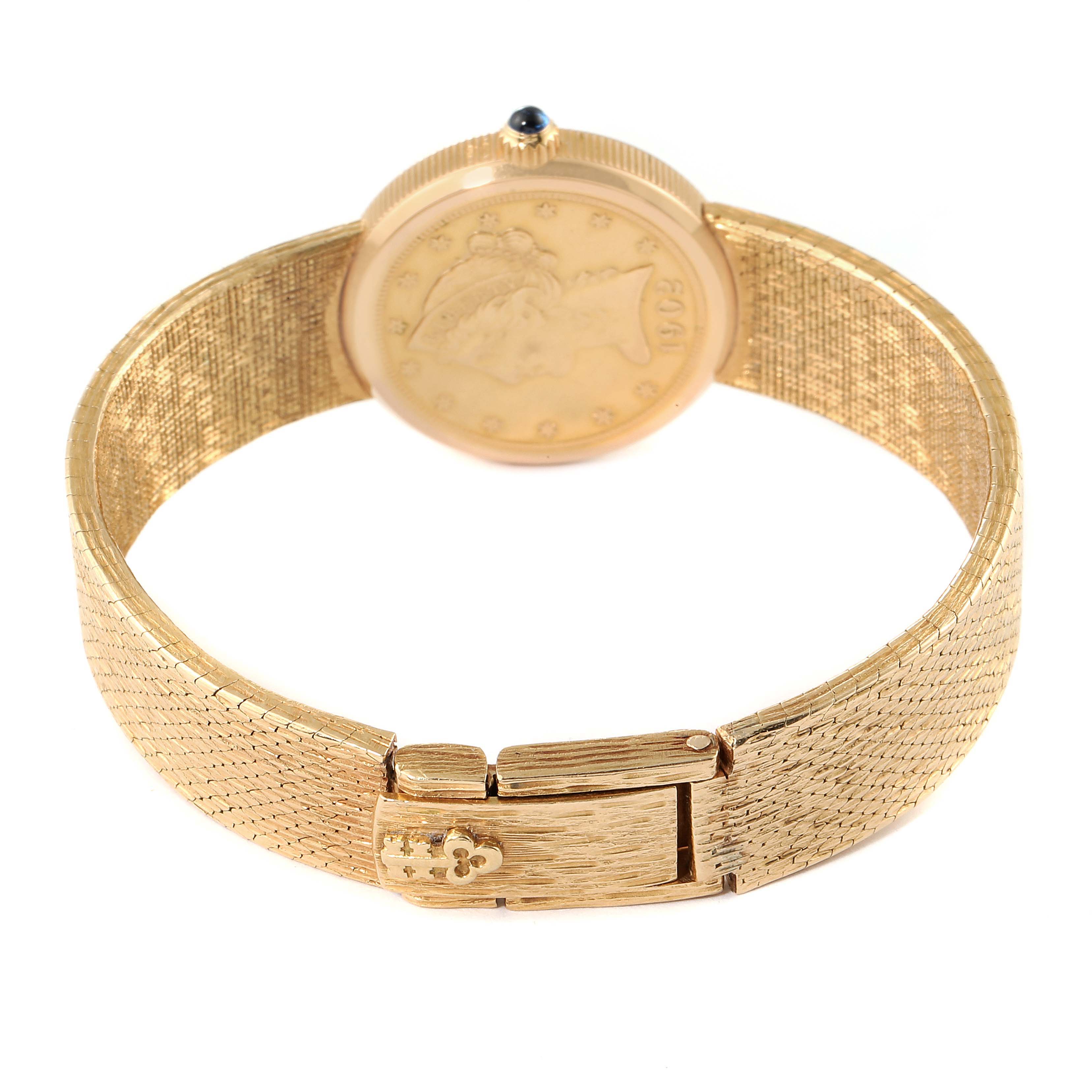 This image shows the back and clasp of the Corum 1902 Women's Yellow Gold Black Dial 1902 Women's Yellow Gold Black Dial Coin 5 Dollars Double Eagle Yellow Gold Ladies Watch 1902 model.
