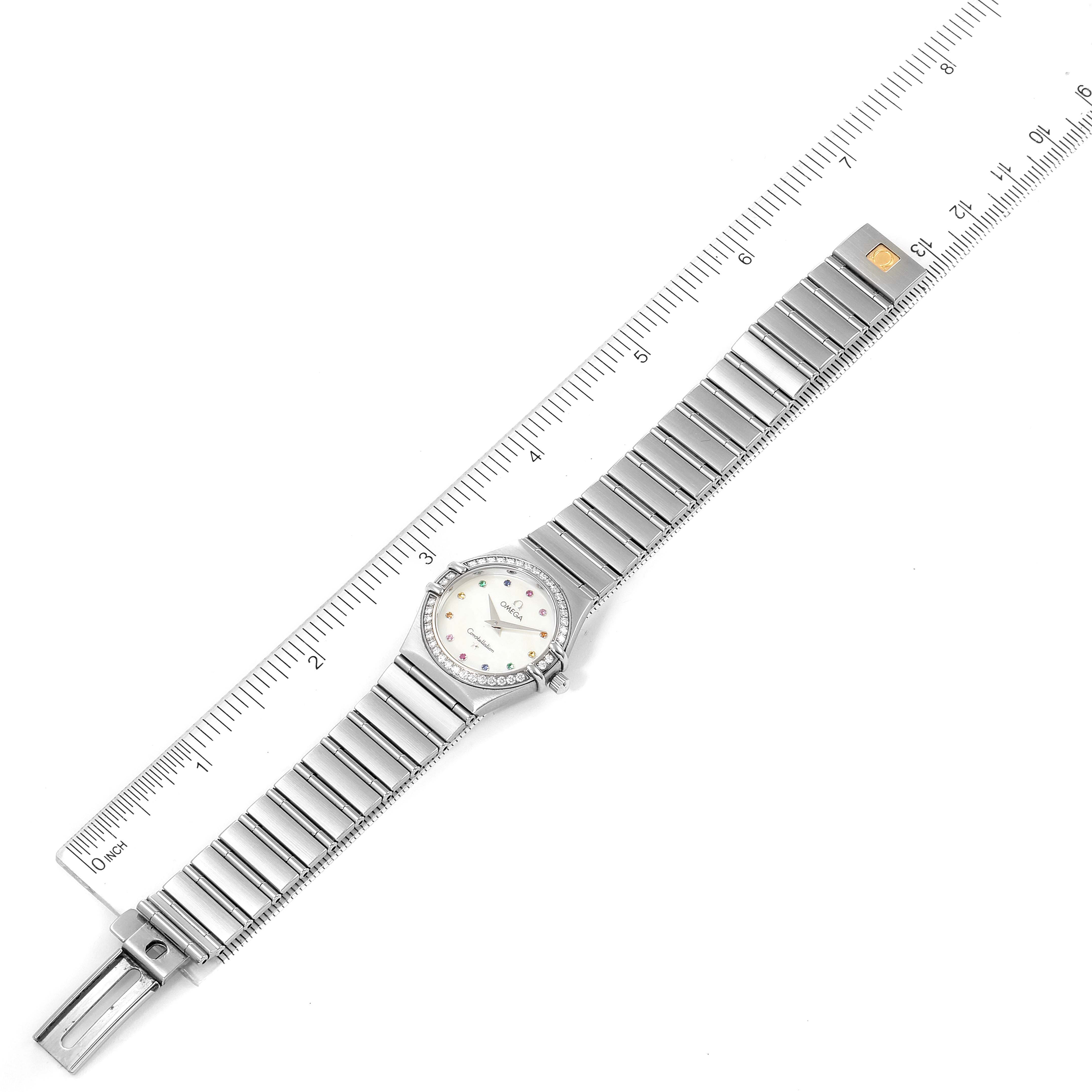 The Omega 1476.79.00 Women
s Stainless Steel Mother of Pearl Dial 1476.79.00 Women
s Stainless Steel Mother of Pearl Dial Constellation Iris My Choice Steel Multi Stone Watch 1476.79.00 is shown from a top-down angle alongside a ruler.