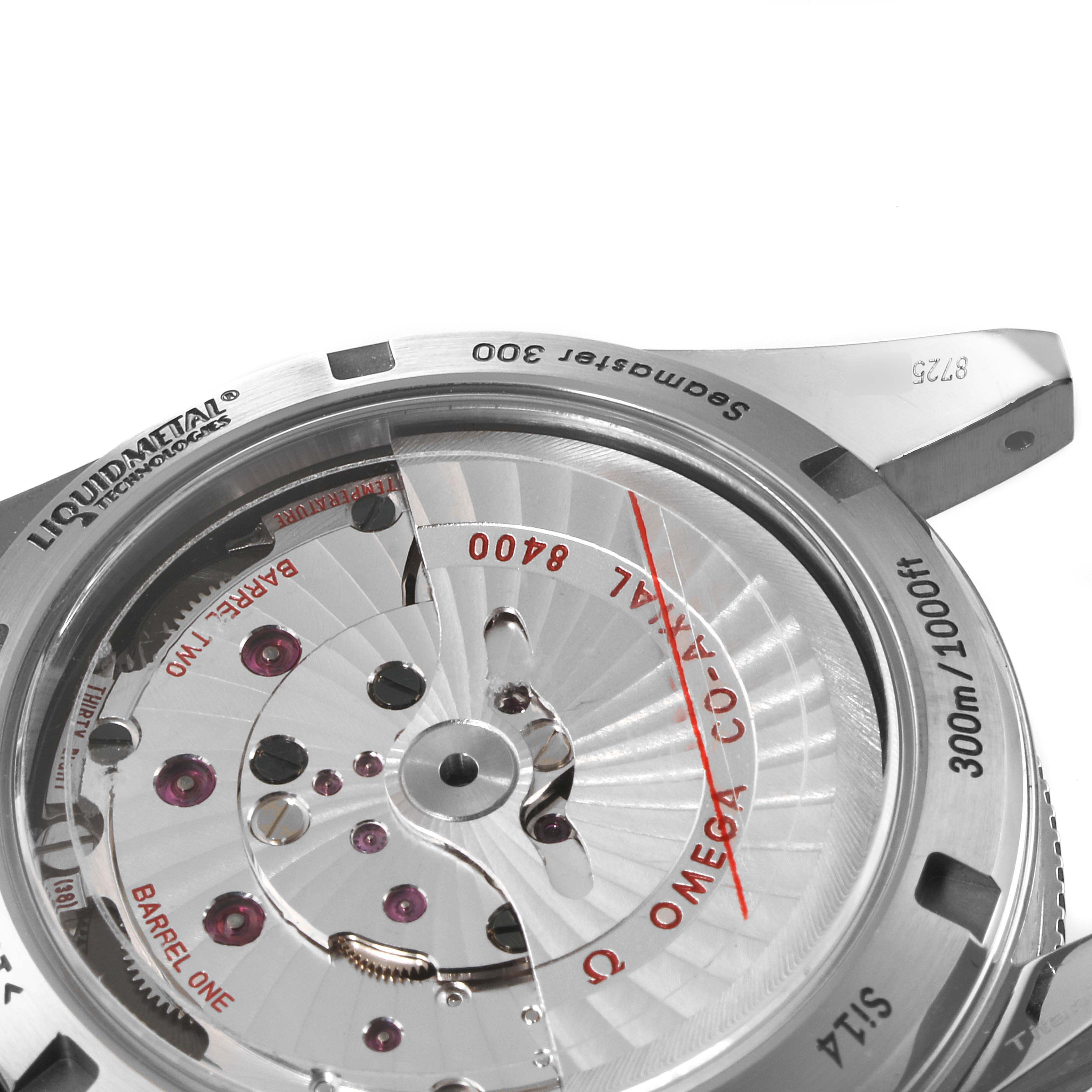 The image shows the back view of an Omega Seamaster 233.90.41.21.03.001 Men's Titanium Blue Dial 233.90.41.21.03.001 Men's Titanium Blue Dial watch, highlighting the movement and co-axial escapement with markings.