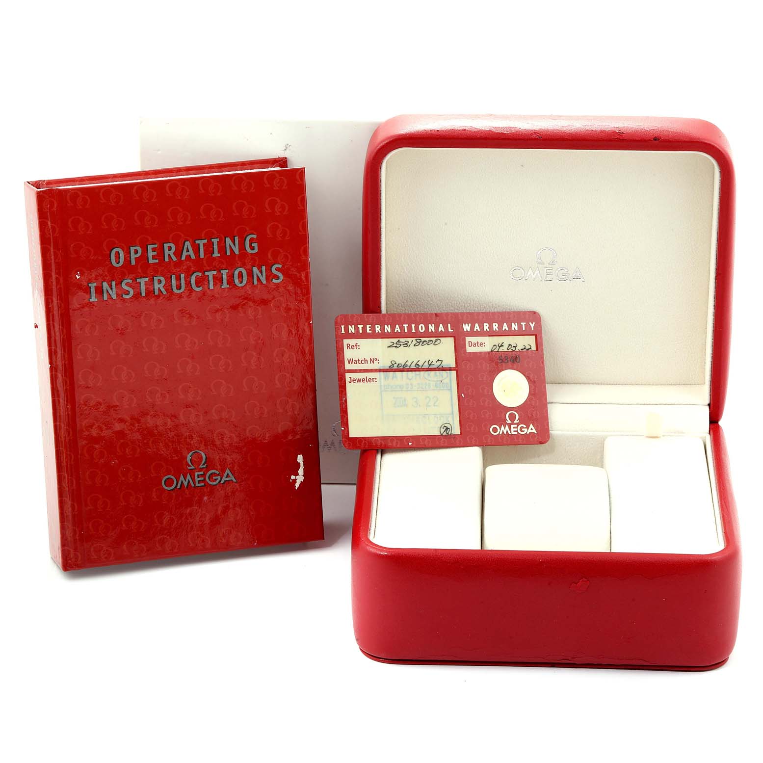 The image shows the operating instructions, warranty card, and box for the Omega Speedmaster 2531.80.00 Men
s Stainless Steel Blue Dial 2531.80.00 Men
s Stainless Steel Blue Dial model watch.