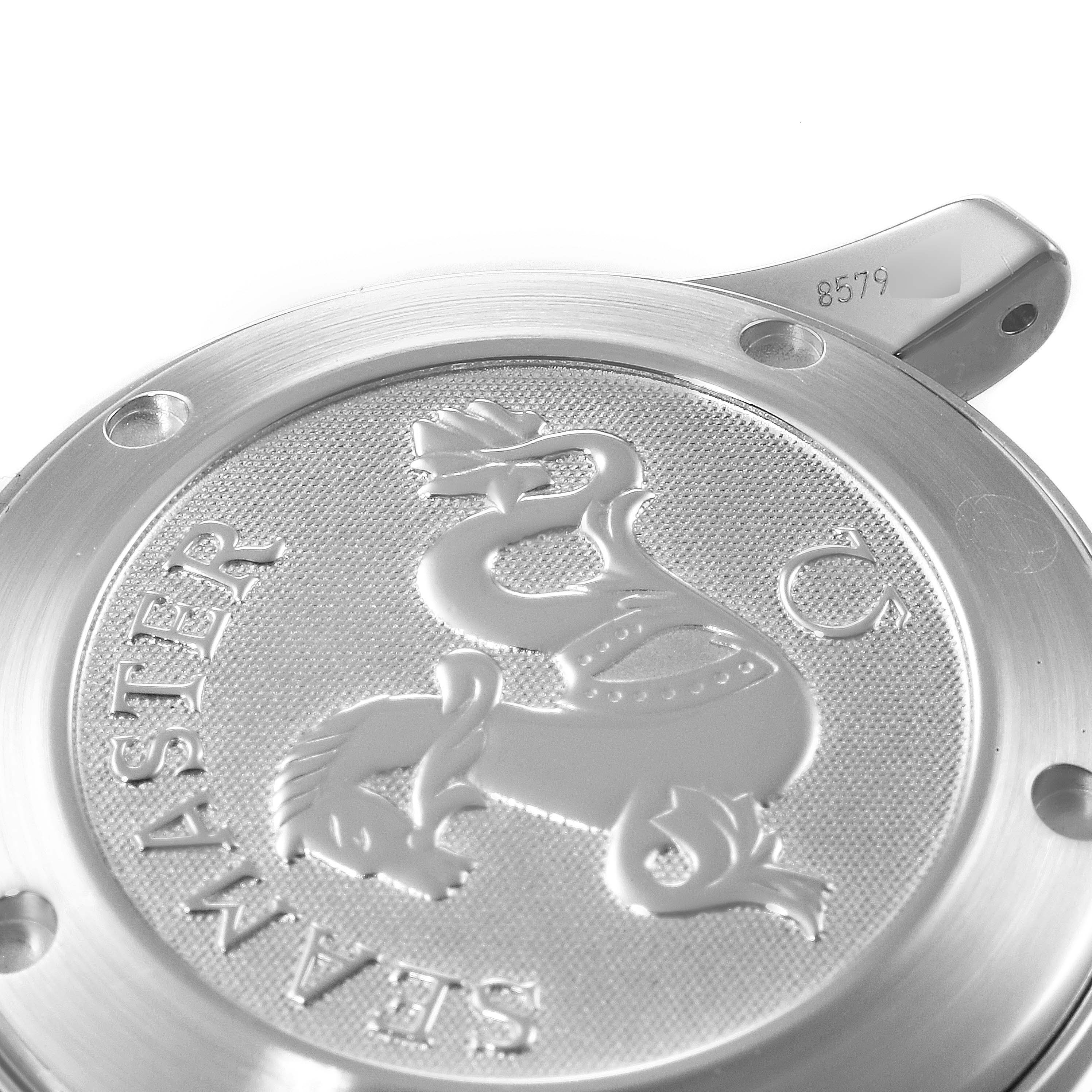 This is a close-up shot of the case back of an Omega Seamaster 212.30.36.20.01.001 Men's Stainless Steel Black Dial 212.30.36.20.01.001 Men's Stainless Steel Black Dial watch, highlighting its engraved details and emblem.