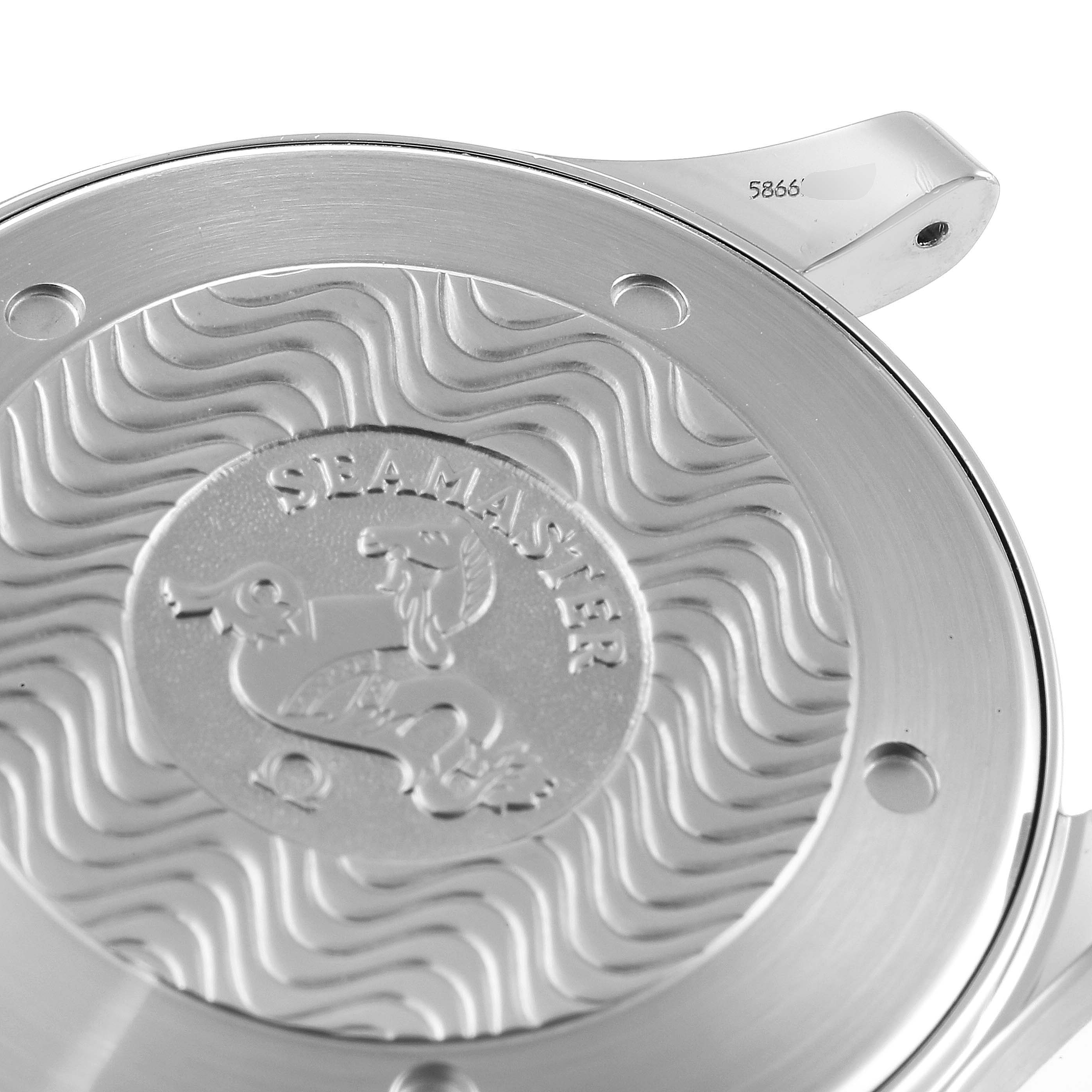 This image shows a close-up of the case back of an Omega Seamaster 2541.80.00 Men's Stainless Steel Blue Dial 2541.80.00 Men's Stainless Steel Blue Dial watch, highlighting its engraved design and branding.