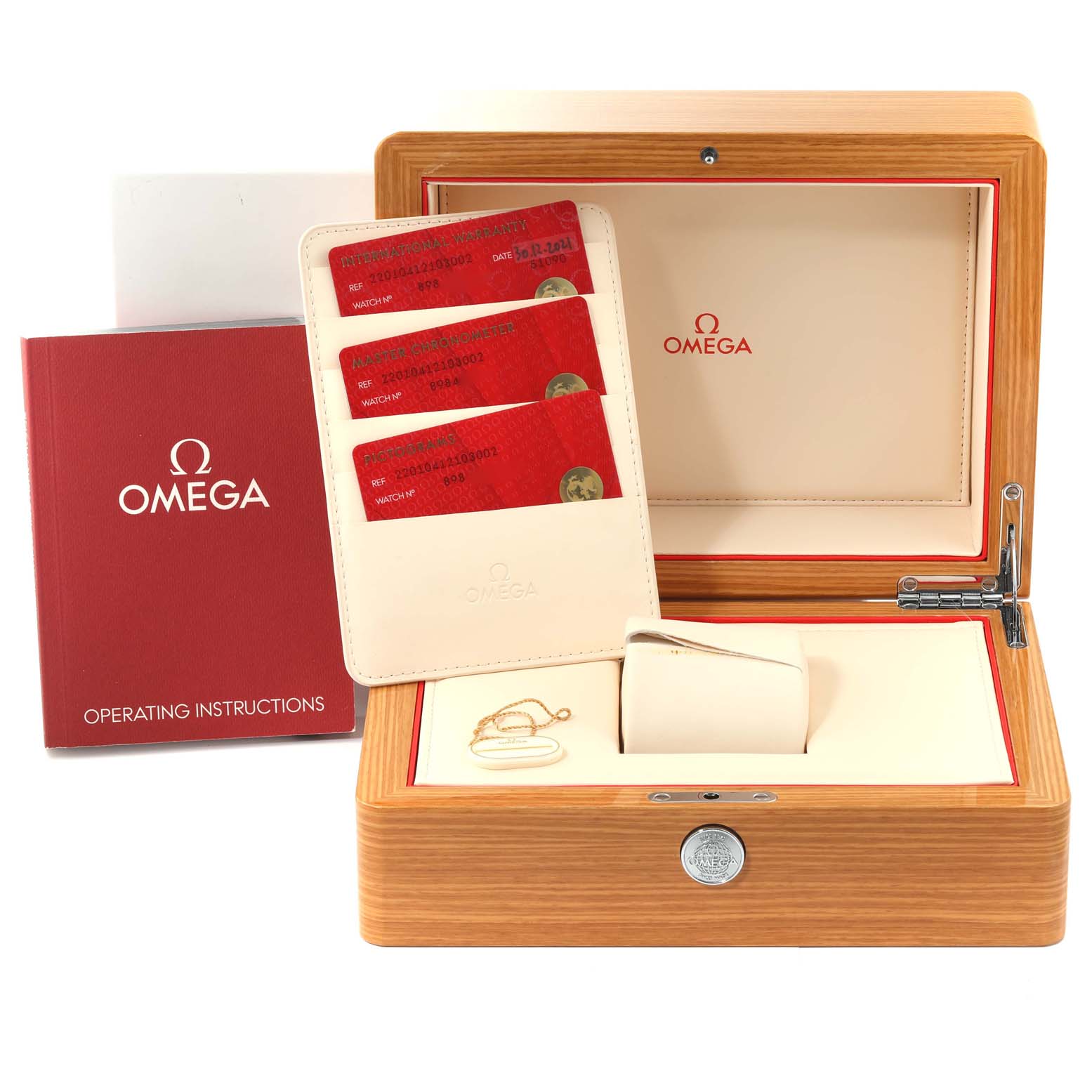 The image shows the packaging and accessories for the Omega Aqua Terra 220.10.41.21.03.002 Men
s Stainless Steel Blue Dial 220.10.41.21.03.002 Men
s Stainless Steel Blue Dial watch, including a display box, instruction manual, and warranty cards.