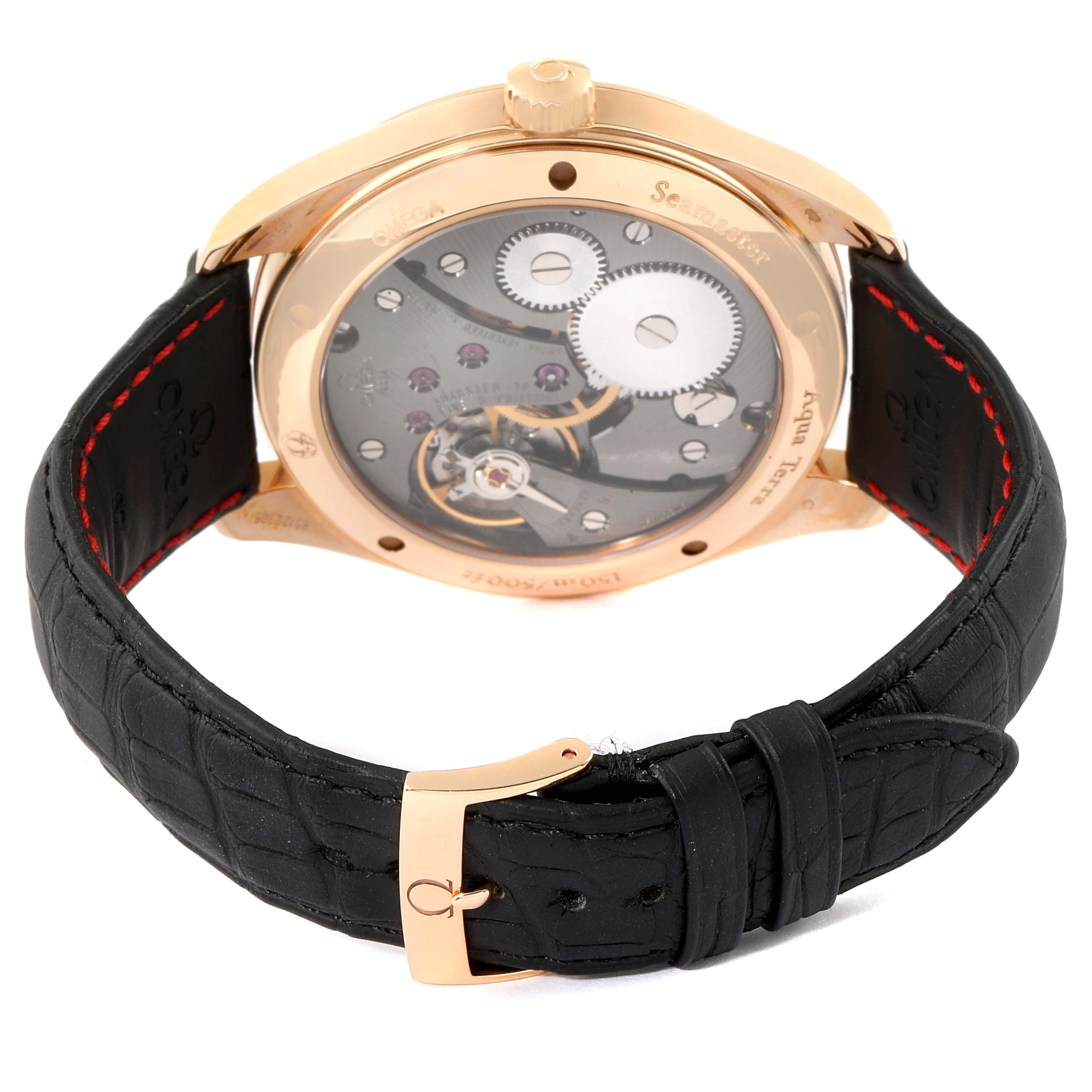 The image shows the back view of the Omega Aqua Terra 231.53.49.10.06.001 Men's Rose Gold Grey Dial 231.53.49.10.06.001 Men's Rose Gold Grey Dial watch, highlighting the movement and the black leather strap with a gold buckle.