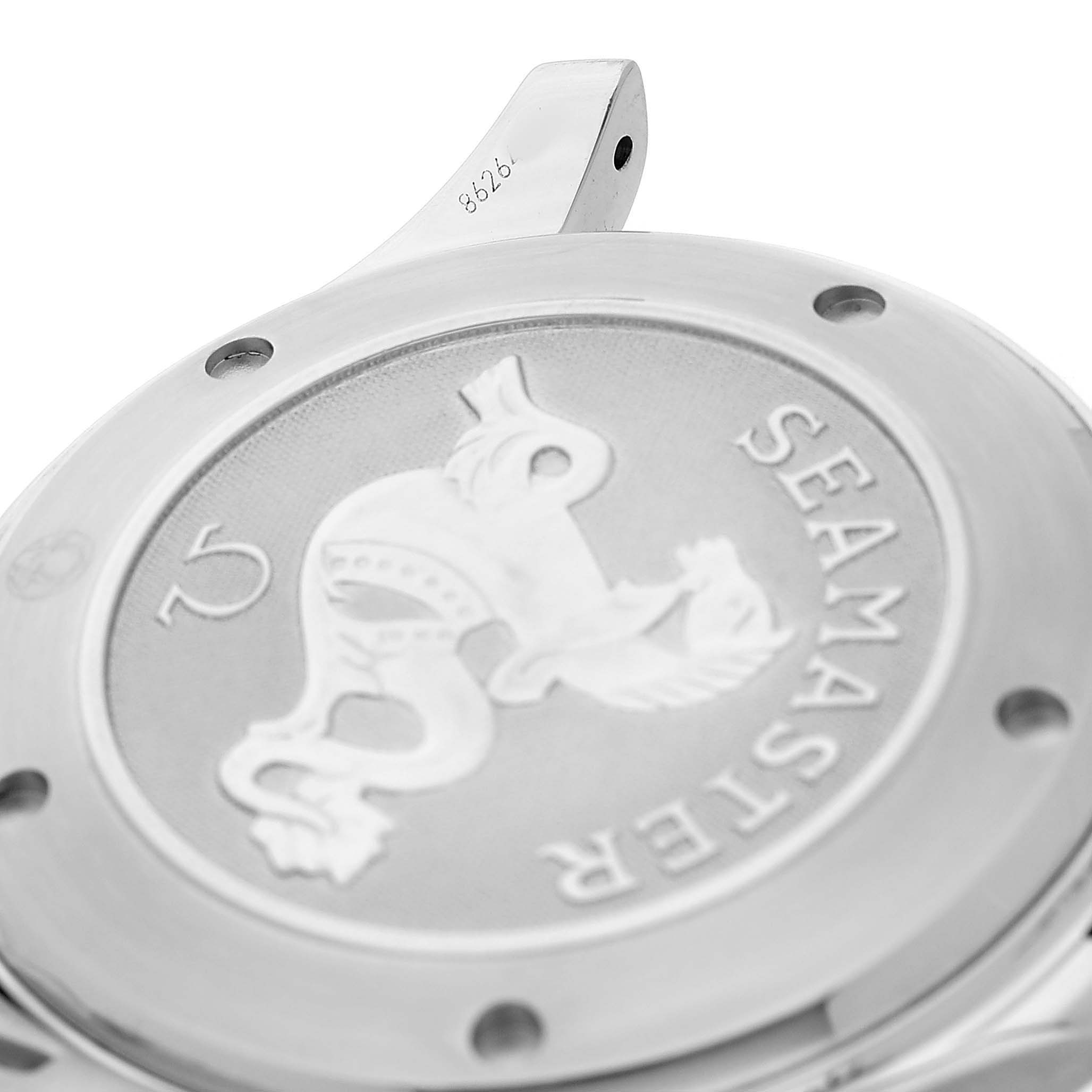 The image shows the engraved case back of an Omega Seamaster 2220.80.00 Men's Stainless Steel Blue Dial, highlighting the logo and surrounding metal.